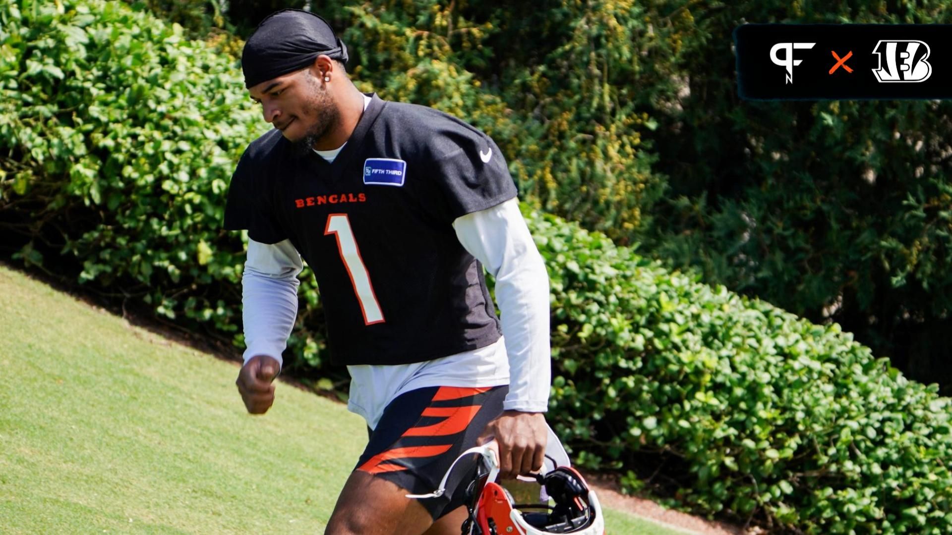 Cincinnati Bengals wide receiver Ja'Marr Chase (1) walks onto the practice field, Wednesday, Sept. 4, 2024, in Cincinnati.