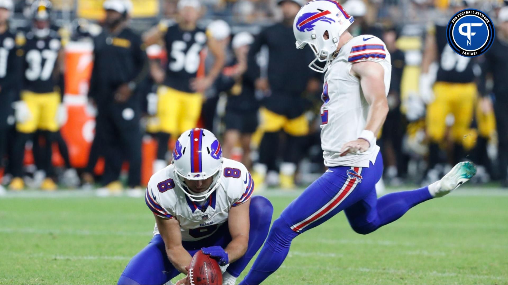 theAug 17, 2024; Pittsburgh, Pennsylvania, USA; Buffalo Bills kicker Tyler Bass (2) kicks a field goal from the hold of punter Sam Martin (8) against Pittsburgh Steelers during the fourth quarter at Acrisure Stadium. Buffalo won 9-3. Mandatory Credit: Charles LeClaire-Imagn Images