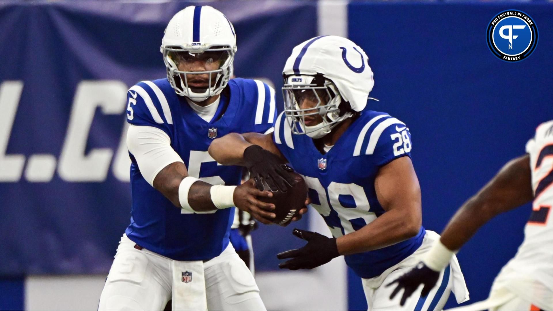 Indianapolis Colts quarterback Anthony Richardson (5) hands the ball off to Indianapolis Colts running back Jonathan Taylor (28) during the first quarter against the Denver Broncos at Lucas Oil Stadium. Where does he sit among our QB fantasy projections?