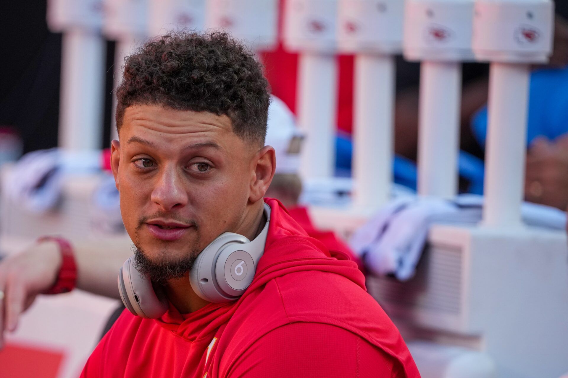 Kansas City Chiefs quarterback Patrick Mahomes (15) talks to players on the bench against the Chicago Bears prior to a game at GEHA Field at Arrowhead Stadium.
