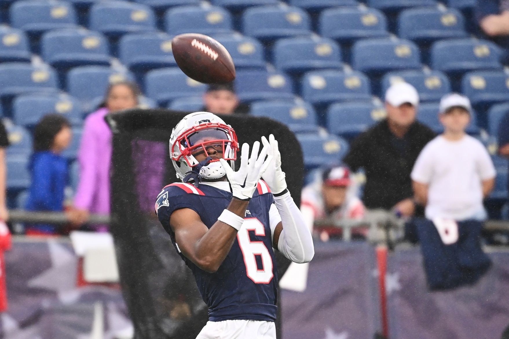 New England Patriots wide receiver Javon Baker (6) warms up before a game against the Carolina Panthers at Gillette Stadium.