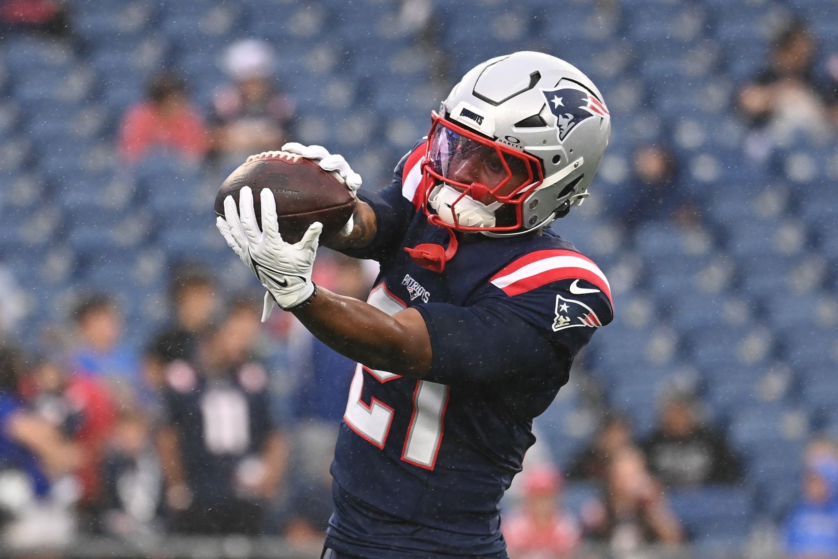 New England Patriots running back Antonio Gibson (21) warms up before a game against the Carolina Panthers at Gillette Stadium. Mandatory Credit: Eric Canha-USA TODAY Sports