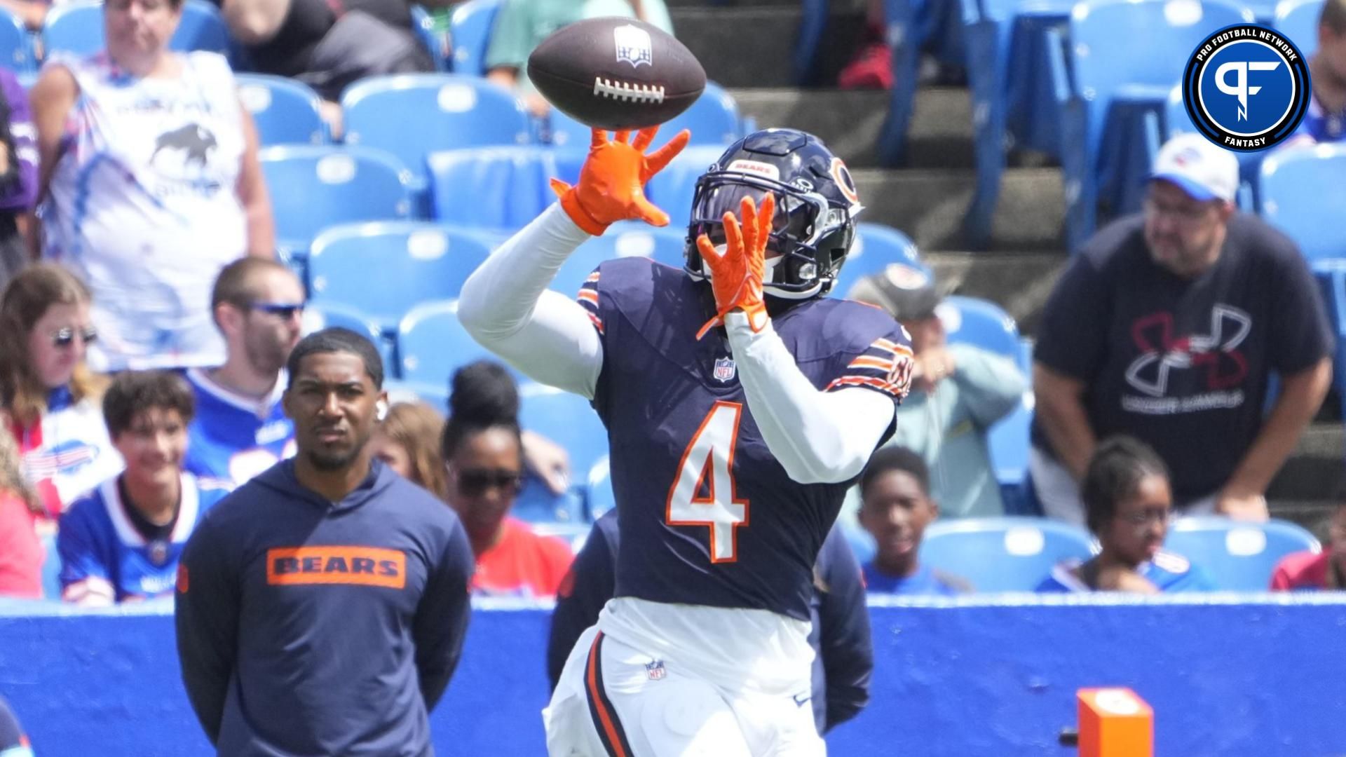 Chicago Bears running back D'Andre Swift (4) warms up prior to the game against the Buffalo Bills at Highmark Stadium. Mandatory Credit: Gregory Fisher-Imagn Images