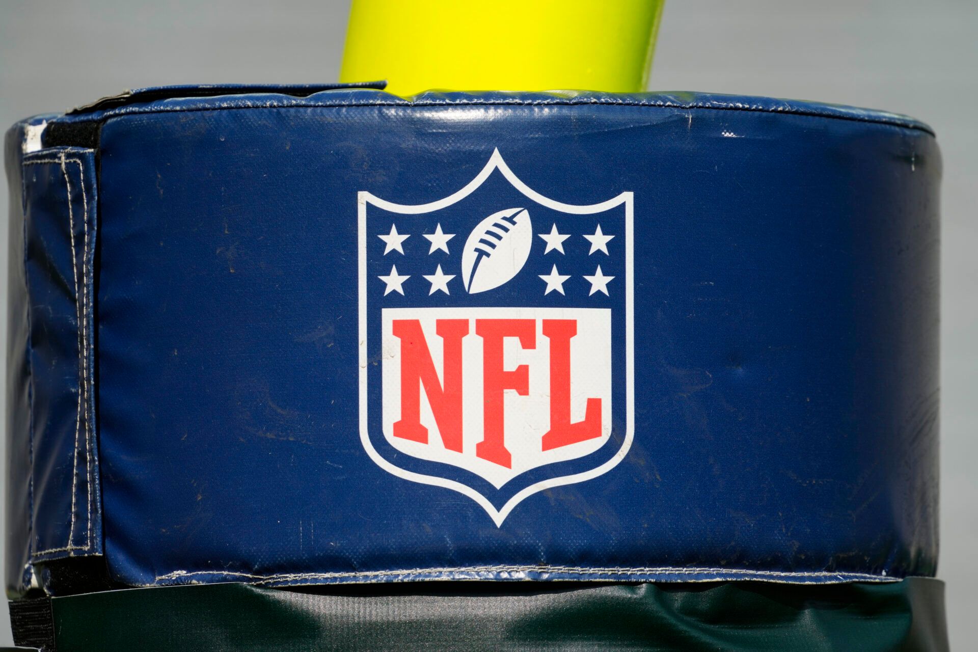 Aug 24, 2024; Green Bay, Wisconsin, USA; General view of the NFL logo on a goalpost during warmups prior to the game between the Baltimore Ravens and Green Bay Packers at Lambeau Field. Mandatory Credit: Jeff Hanisch-USA TODAY Sports