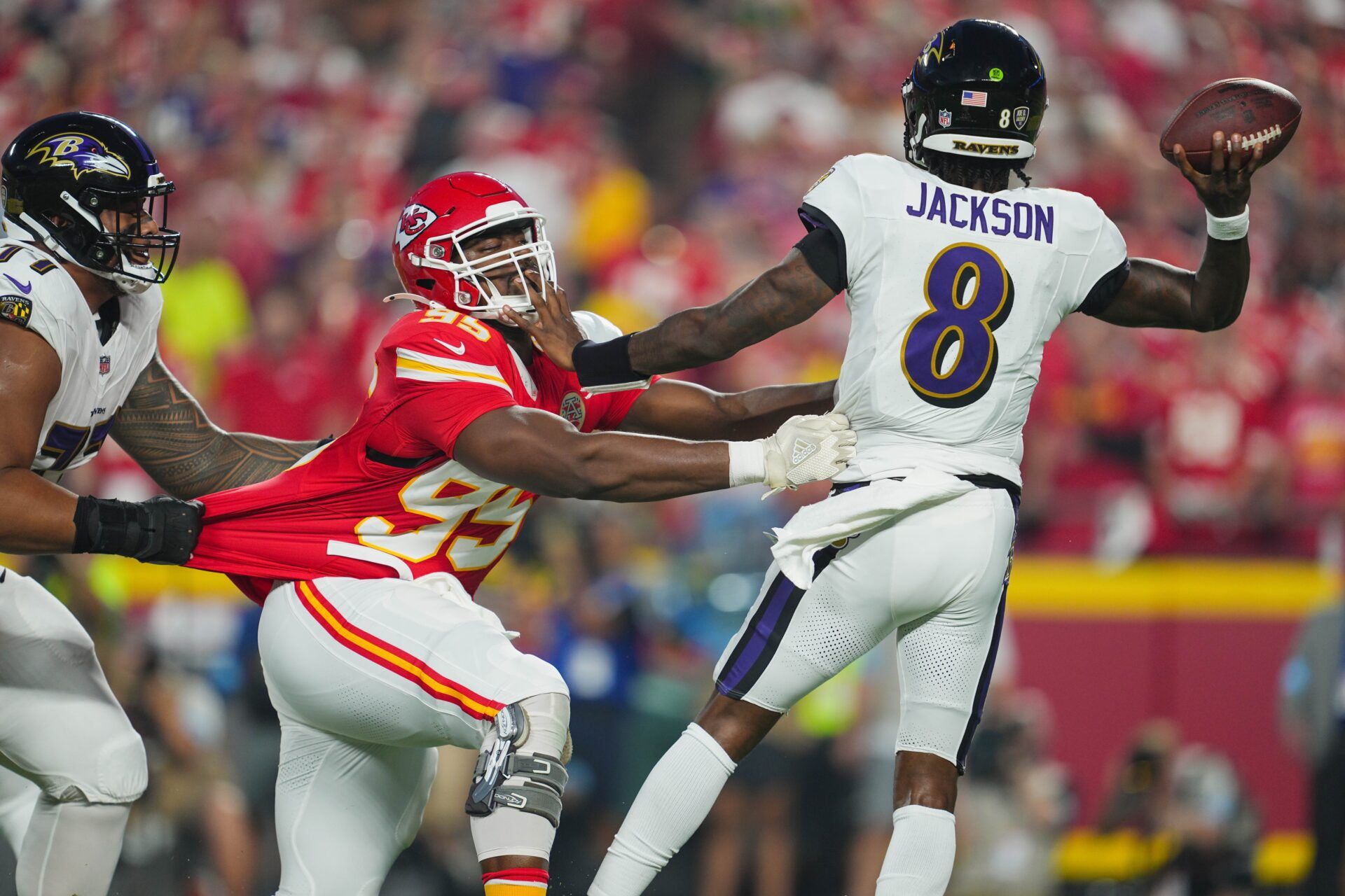 Kansas City Chiefs defensive tackle Chris Jones (95) rushes Baltimore Ravens quarterback Lamar Jackson (8) during the first half at GEHA Field at Arrowhead Stadium. Mandatory Credit: Jay Biggerstaff-Imagn Images