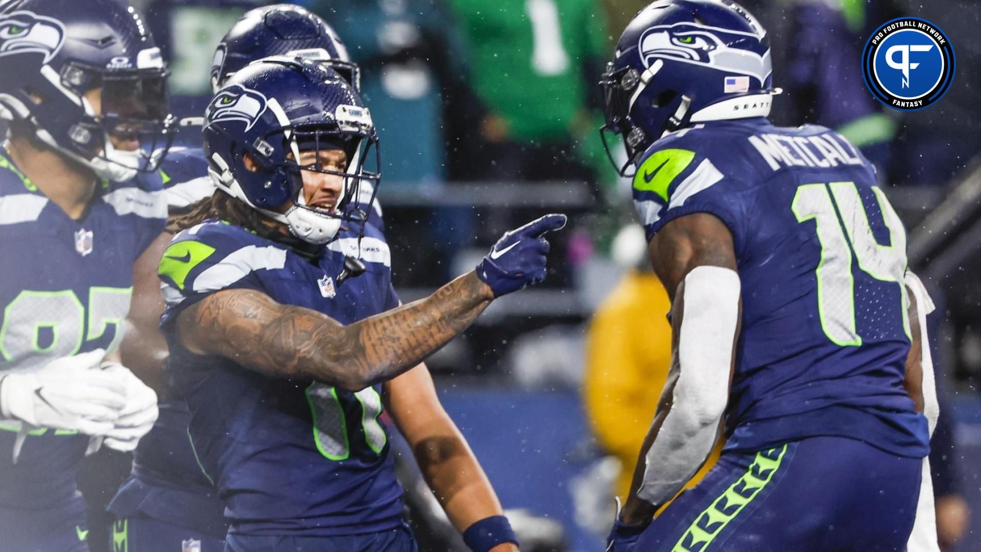 Seattle Seahawks wide receiver Jaxon Smith-Njigba (11) celebrates with wide receiver DK Metcalf (14) after catching a touchdown pass against the Philadelphia Eagles during the fourth quarter at Lumen Field. Mandatory Credit: Joe Nicholson-Imagn Images