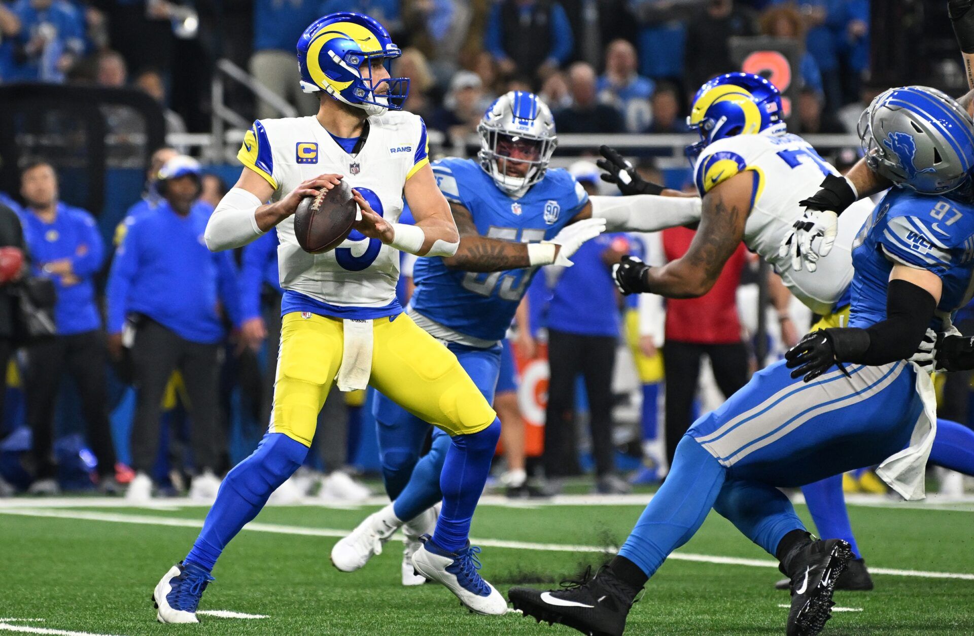 Los Angeles Rams quarterback Matthew Stafford (9) drops to throw during the first half of a 2024 NFC wild card game against the Detroit Lions at Ford Field. Mandatory Credit: Lon Horwedel-USA TODAY Sports