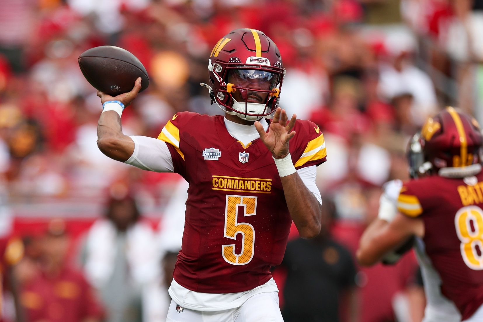 Washington Commanders quarterback Jayden Daniels (5) drops back to pass against the Tampa Bay Buccaneers in the third quarter at Raymond James Stadium. Mandatory Credit: Nathan Ray Seebeck-Imagn Images