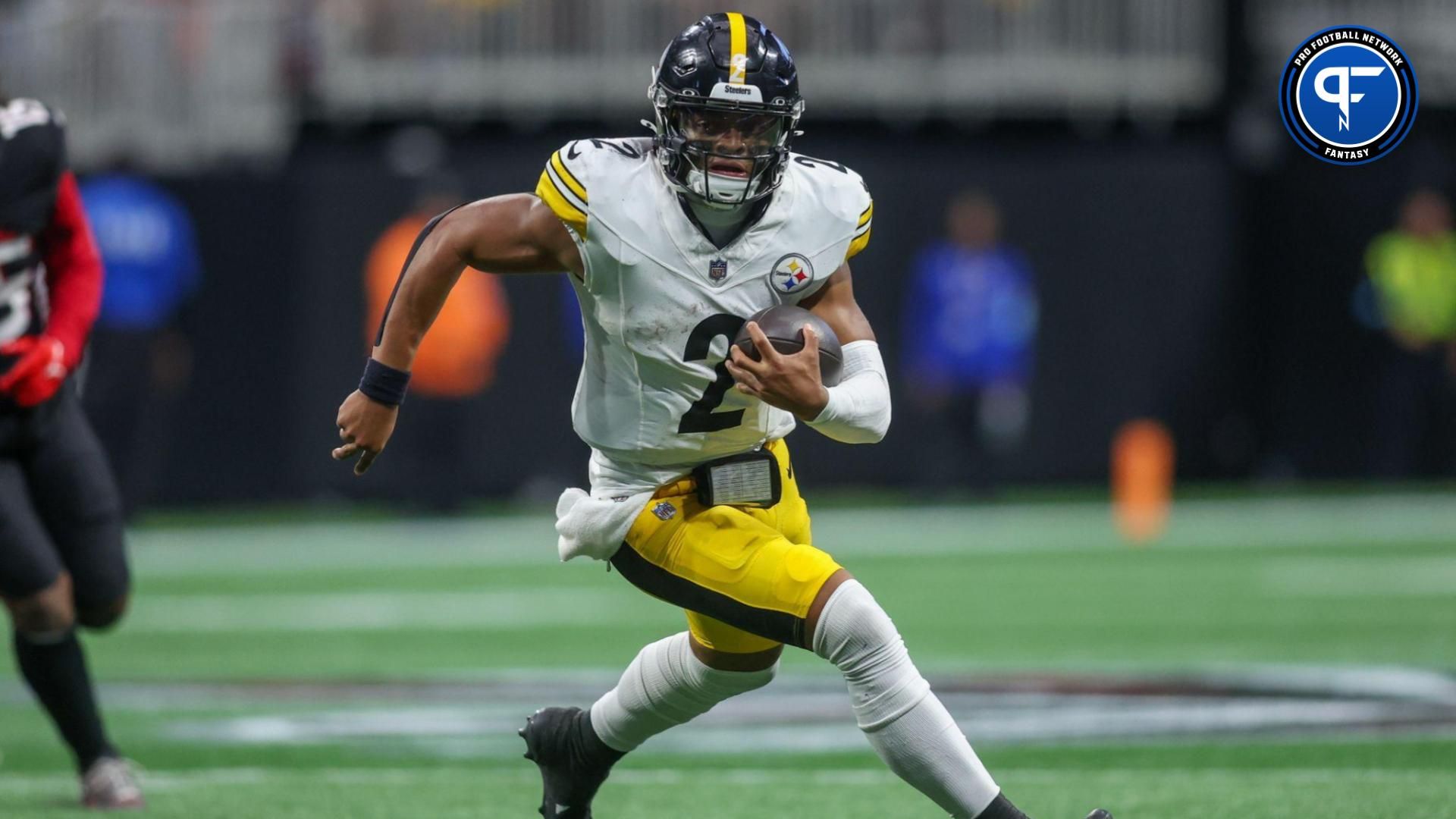 Pittsburgh Steelers quarterback Justin Fields (2) runs the ball against the Atlanta Falcons in the third quarter at Mercedes-Benz Stadium. Mandatory Credit: Brett Davis-Imagn Images