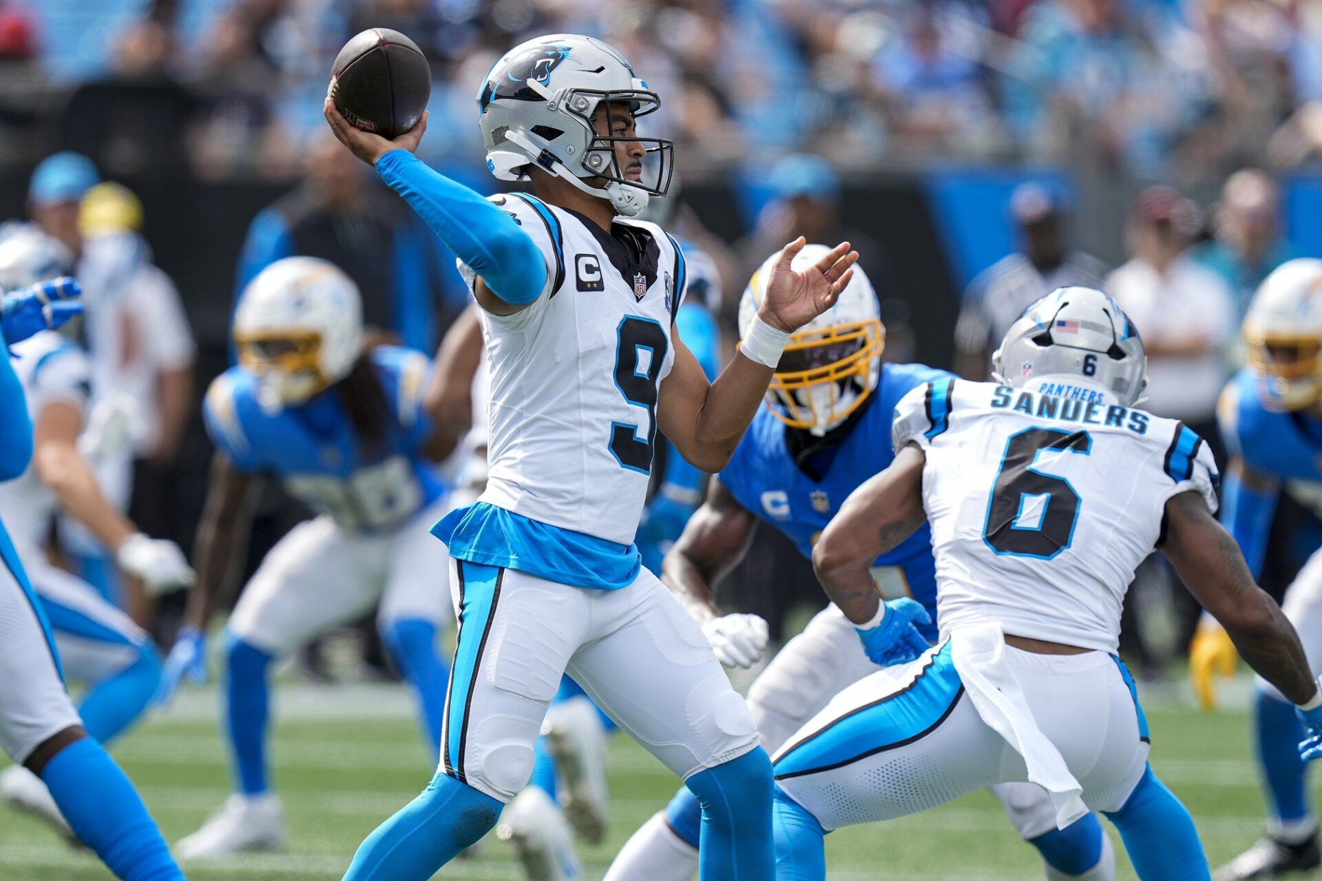 Carolina Panthers quarterback Bryce Young (9) throws the ball against the Los Angeles Chargers during the second half at Bank of America Stadium. Mandatory Credit: Jim Dedmon-Imagn Images