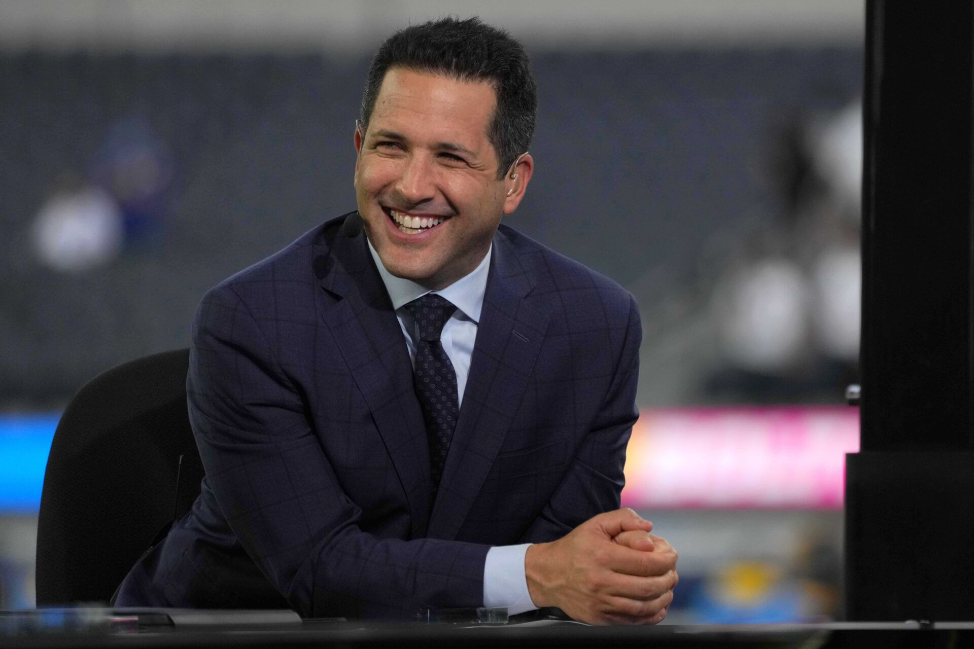 Oct 4, 2021; Inglewood, California, USA; Adam Schefter broadcasts from the ESPN Monday Night Football Countdown set before a game between the Los Angeles Chargers and the Las Vegas Raiders at SoFi Stadium. Mandatory Credit: Kirby Lee-USA TODAY Sports