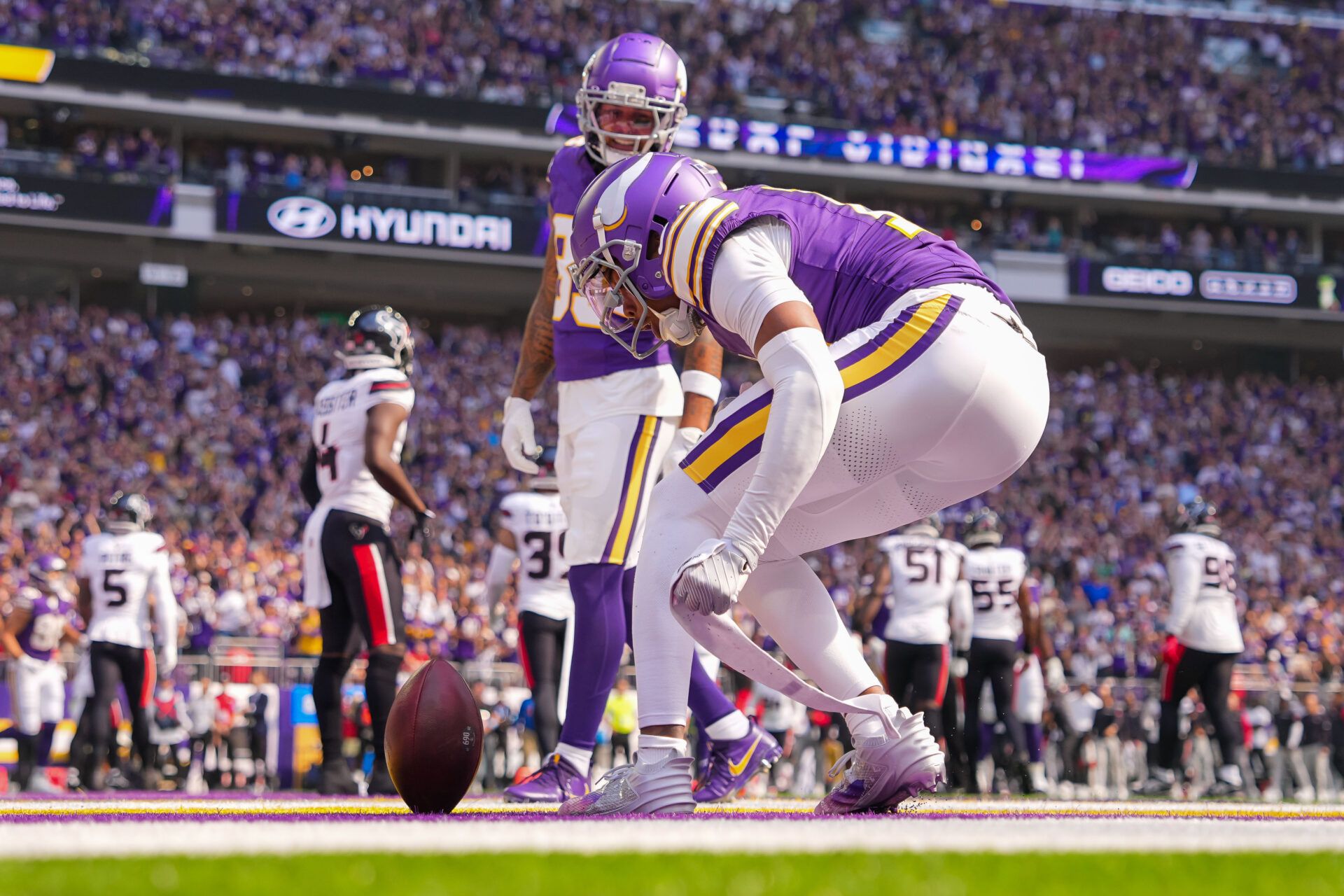 Sep 22, 2024; Minneapolis, Minnesota, USA; Minnesota Vikings wide receiver Justin Jefferson (18) celebrates his touchdown against the Houston Texans in the first quarter at U.S. Bank Stadium. Mandatory Credit: Brad Rempel-Imagn Images