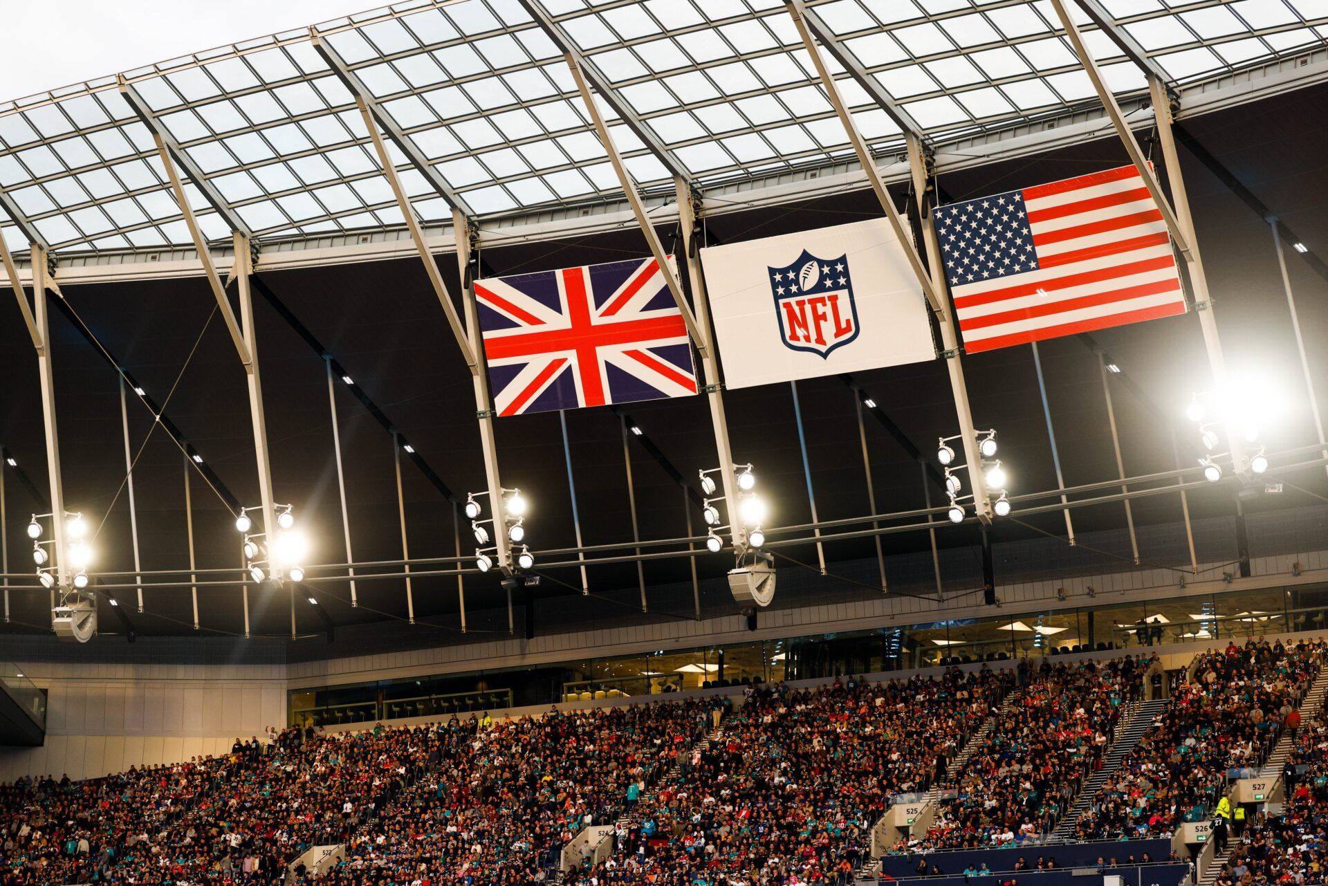 fans look on during a game featuring the Miami Dolphins and Jacksonville Jaguars at Tottenham Hotspur Stadium.