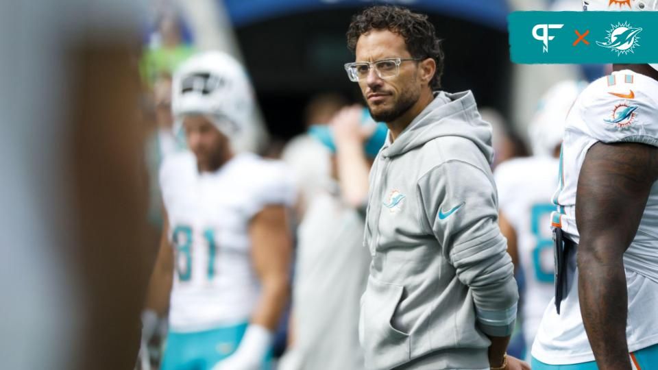 Miami Dolphins head coach Mike McDaniel watches pregame warmups against the Seattle Seahawks at Lumen Field.