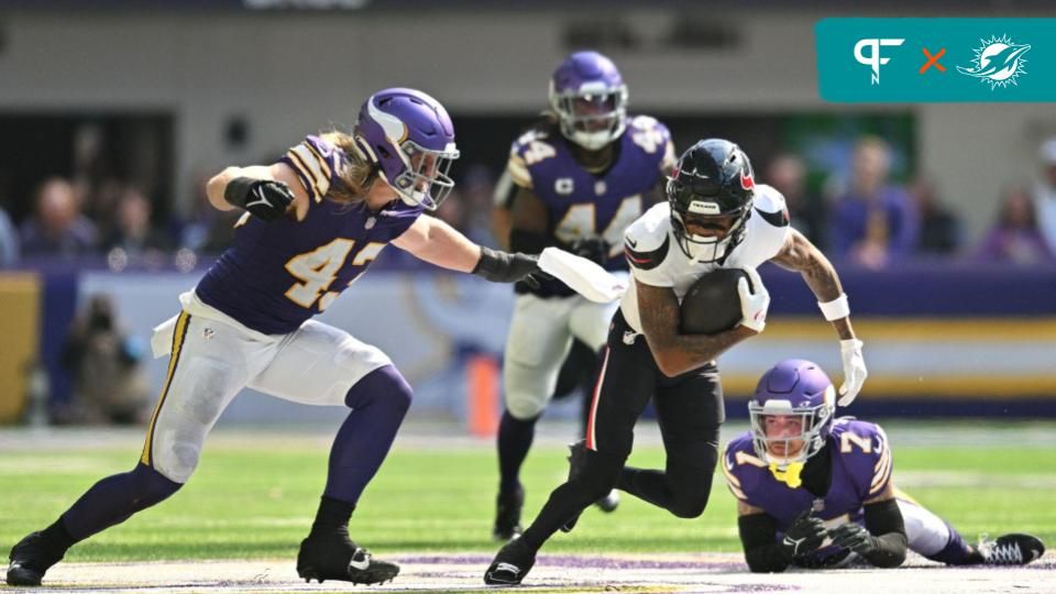 Minnesota Vikings linebacker Andrew Van Ginkel (43) tackles Houston Texans wide receiver Robert Woods (2) as cornerback Byron Murphy Jr. (7) look on during the fourth quarter at U.S. Bank Stadium.