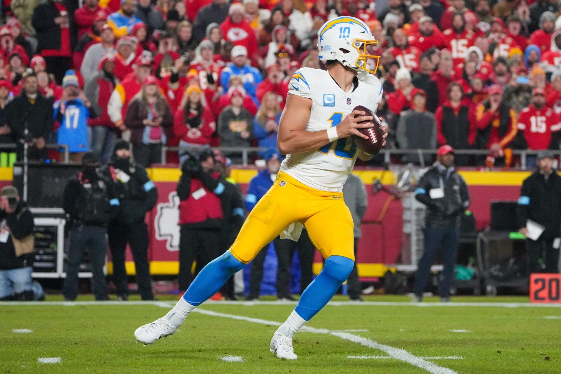 Los Angeles Chargers quarterback Justin Herbert (10) drops back to pass against the Kansas City Chiefs during the first half at GEHA Field at Arrowhead Stadium.