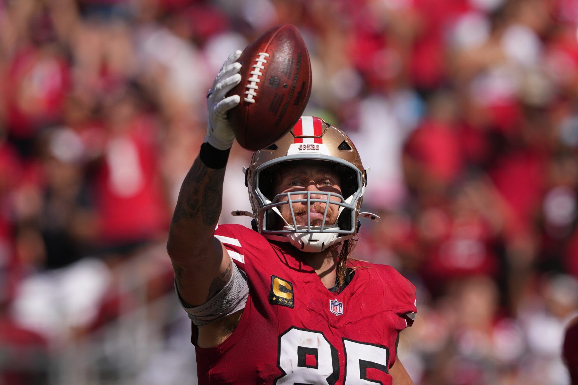 San Francisco 49ers tight end George Kittle (85) reacts after scoring a touchdown against the Arizona Cardinals during the first quarter at Levi's Stadium.