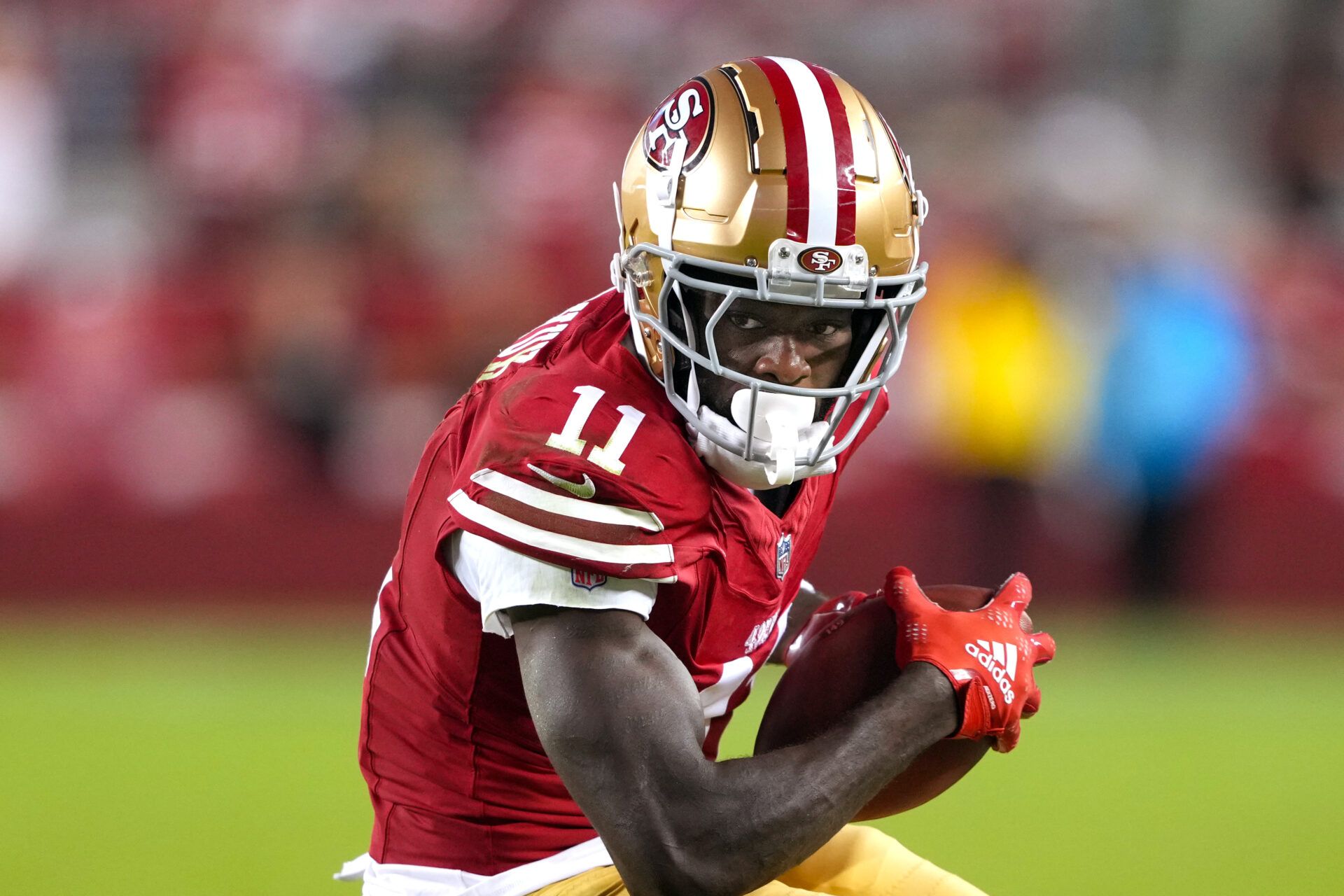 Sep 9, 2024; Santa Clara, California, USA; San Francisco 49ers wide receiver Brandon Aiyuk (11) runs after a catch against the New York Jets during the fourth quarter at Levi's Stadium. Mandatory Credit: Darren Yamashita-Imagn Images