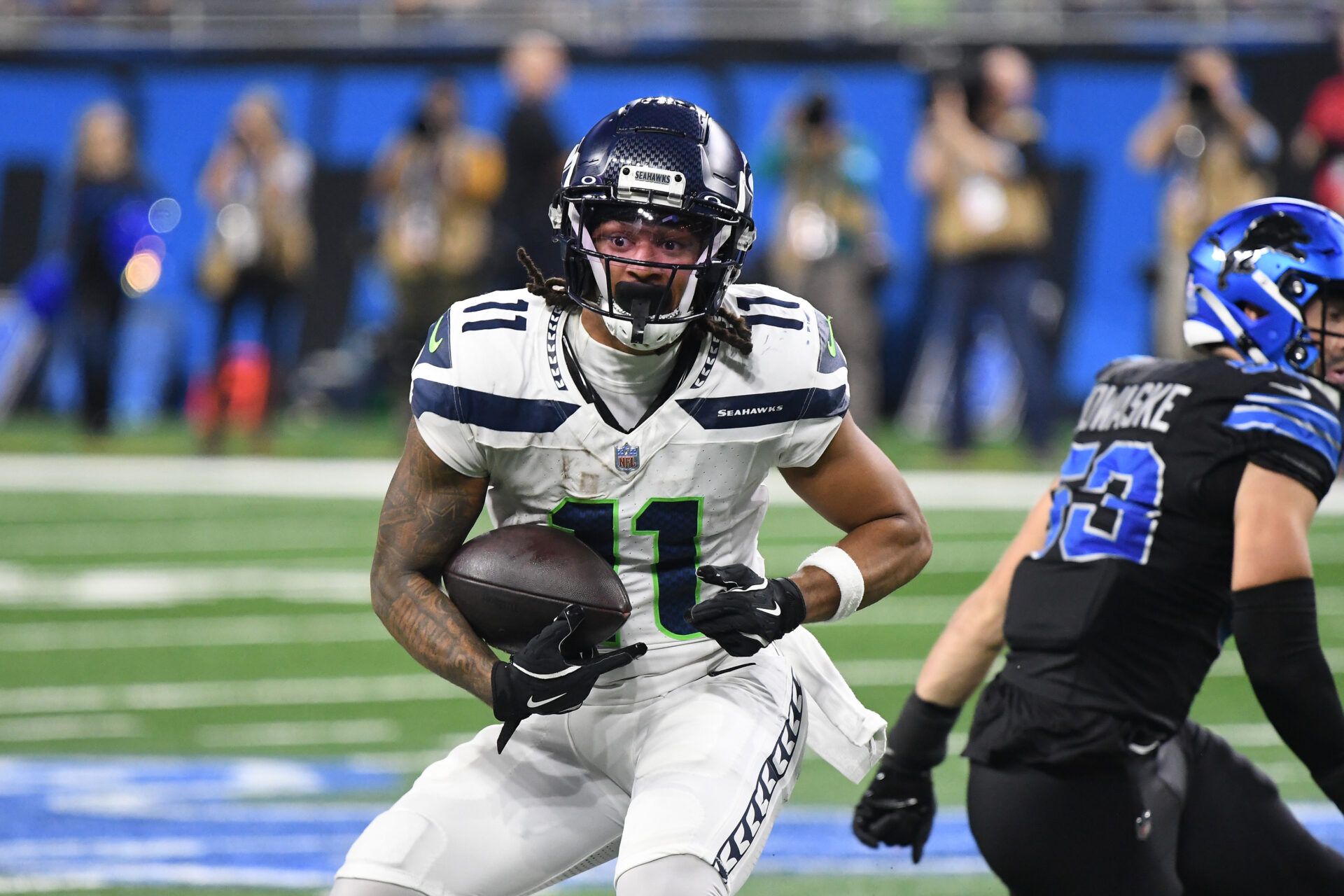 Sep 30, 2024; Detroit, Michigan, USA; Seattle Seahawks wide receiver Jaxon Smith-Njigba (11) runs the ball against the Detroit Lions in the third quarter at Ford Field. Mandatory Credit: Eamon Horwedel-Imagn Images