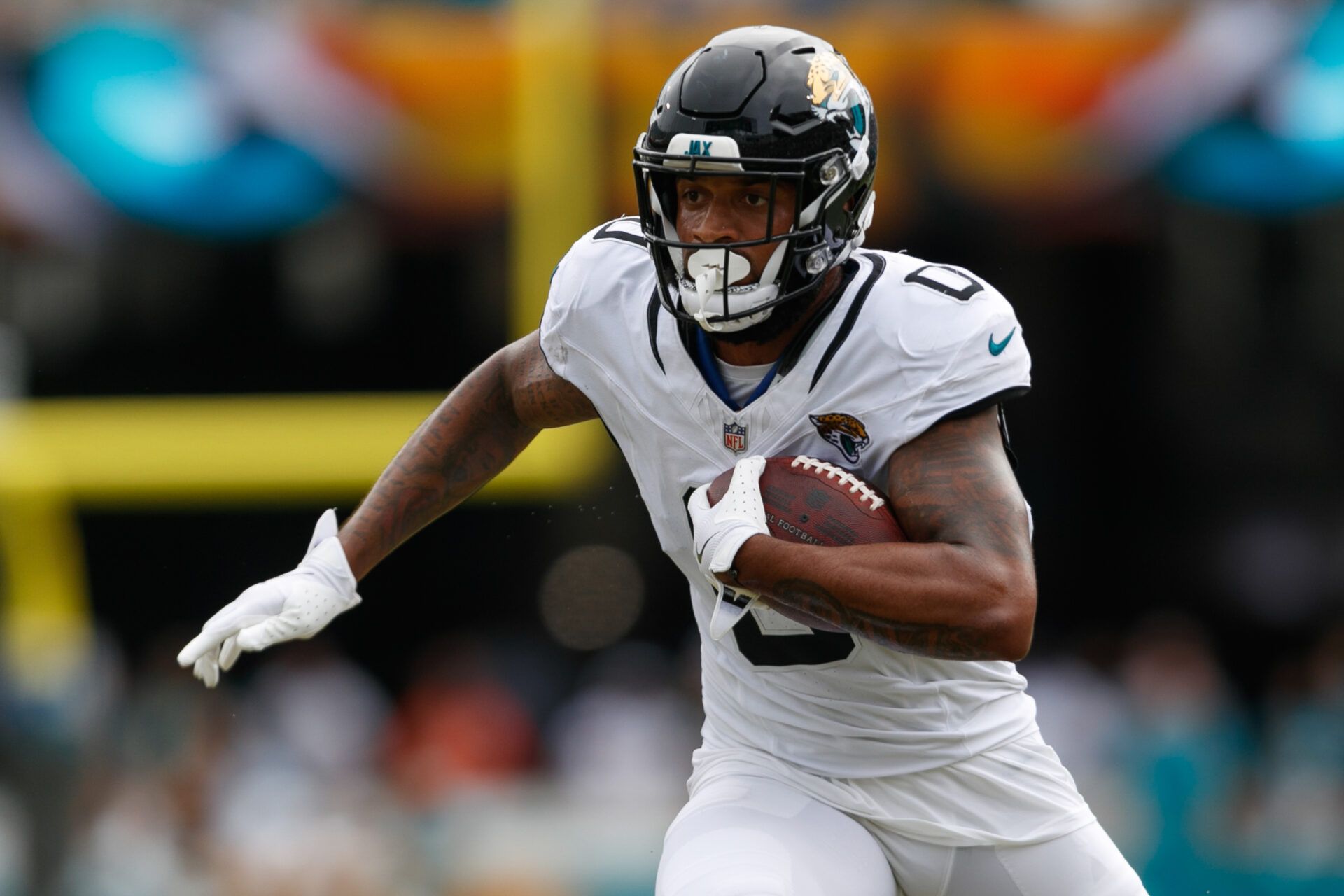 Sep 15, 2024; Jacksonville, Florida, USA; Jacksonville Jaguars wide receiver Gabe Davis (0) runs the ball against the Cleveland Browns during the fourth quarter at EverBank Stadium. Mandatory Credit: Morgan Tencza-Imagn Images