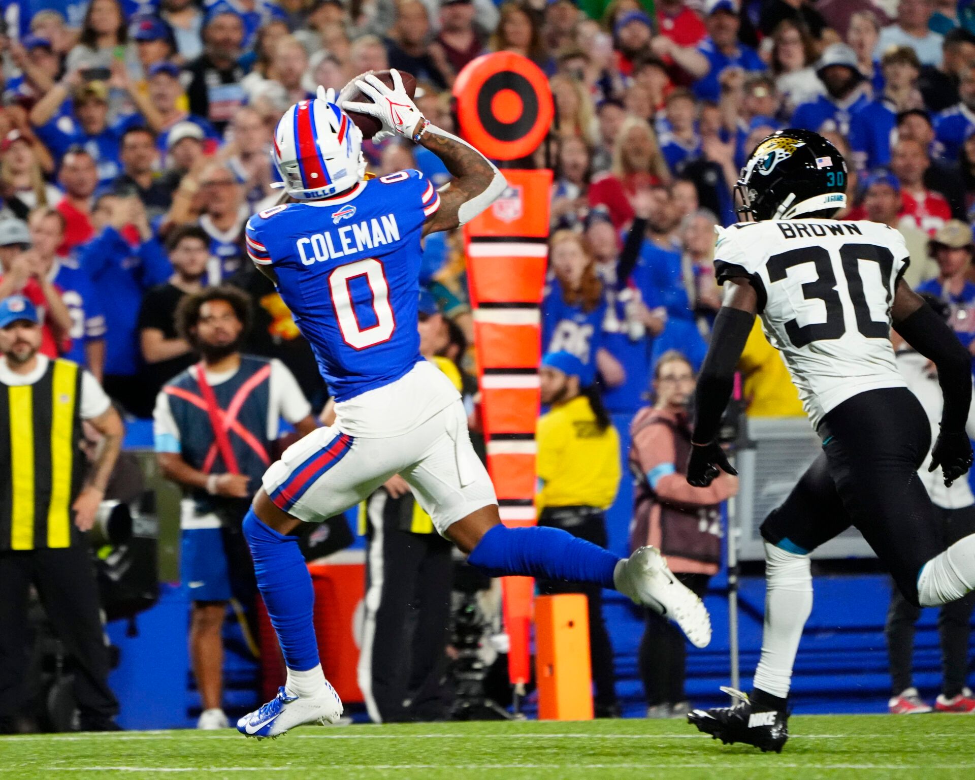 Sep 23, 2024; Orchard Park, New York, USA; Buffalo Bills wide receiver Keon Coleman (0) makes a catch and scores a touchdown against the Jacksonville Jaguars during the first half at Highmark Stadium. Mandatory Credit: Gregory Fisher-Imagn Images