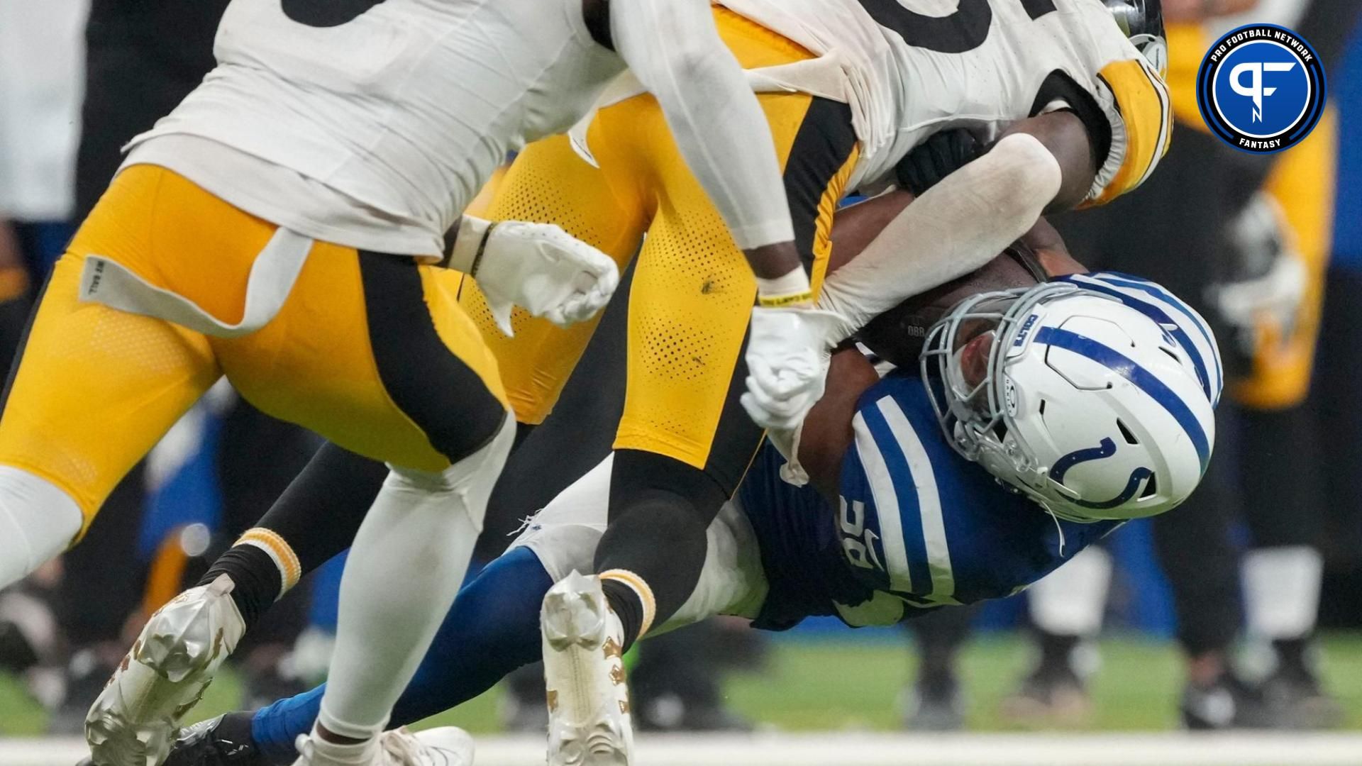 Pittsburgh Steelers safety DeShon Elliott (25) tackles Indianapolis Colts running back Jonathan Taylor (28) on Sunday, Sept. 29, 2024, during a game against the Pittsburgh Steelers at Lucas Oil Stadium in Indianapolis.