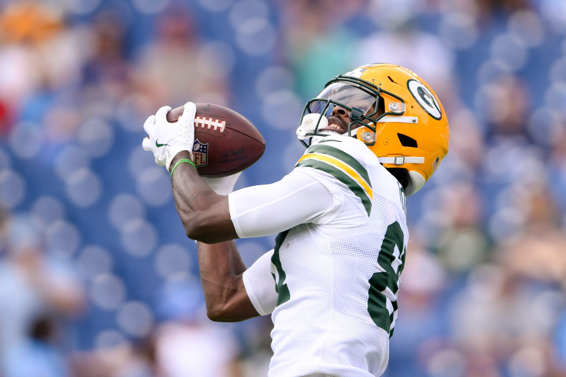 Sep 22, 2024; Nashville, Tennessee, USA; Green Bay Packers wide receiver Romeo Doubs (87) makes a catch during pregame warmups before the game against the Tennessee Titans at Nissan Stadium. Mandatory Credit: Steve Roberts-Imagn Images