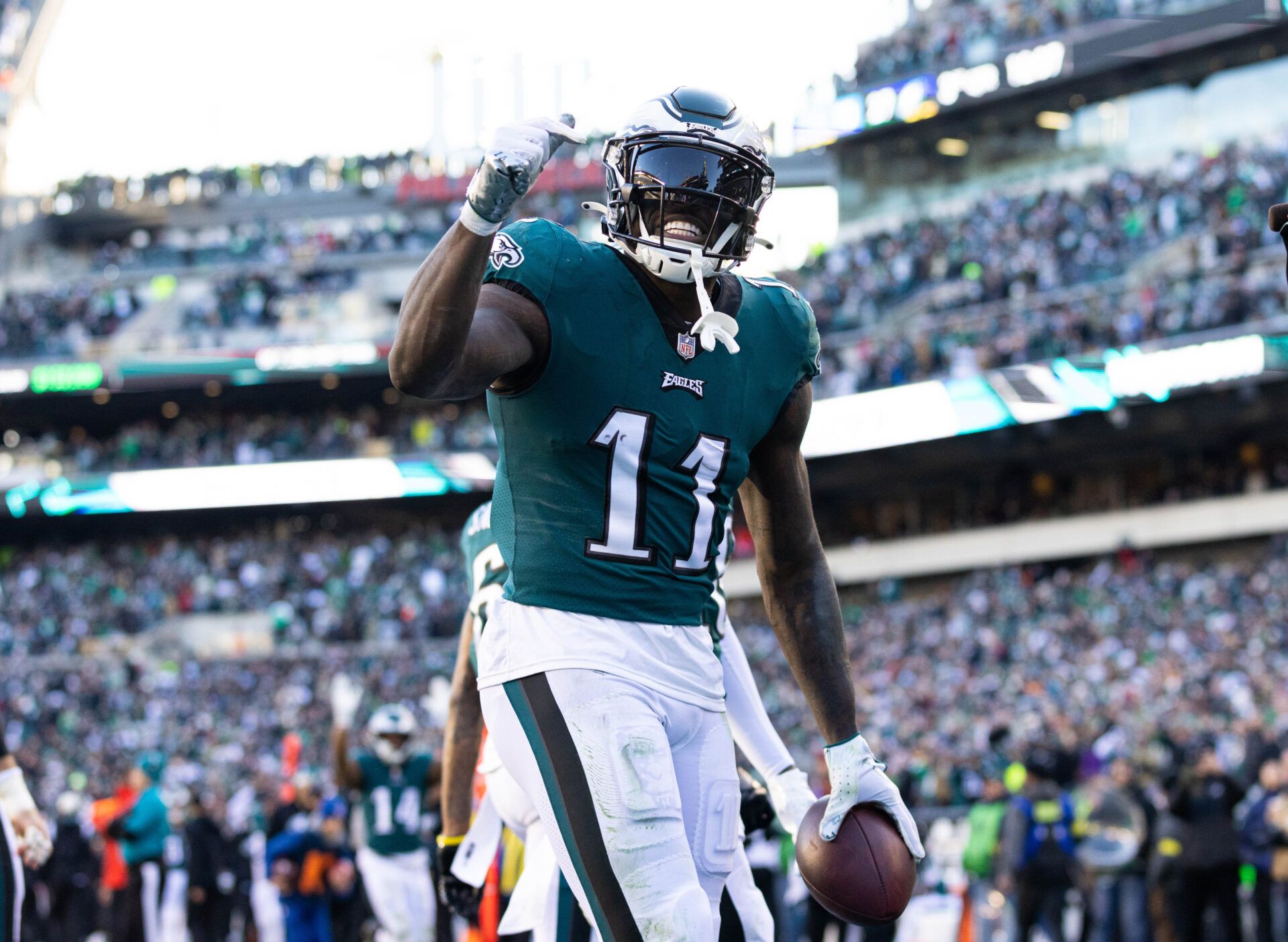 Dec 4, 2022; Philadelphia, Pennsylvania, USA; Philadelphia Eagles wide receiver A.J. Brown (11) celebrates his touchdown catch against the Tennessee Titans during the third quarter at Lincoln Financial Field. Mandatory Credit: Bill Streicher-USA TODAY Sports