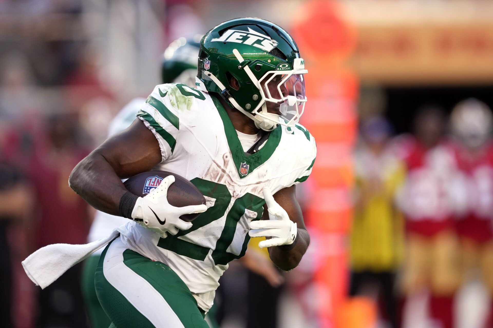 Sep 9, 2024; Santa Clara, California, USA; New York Jets running back Breece Hall (20) carries the ball against the San Francisco 49ers during the second quarter at Levi's Stadium. Mandatory Credit: Darren Yamashita-Imagn Images