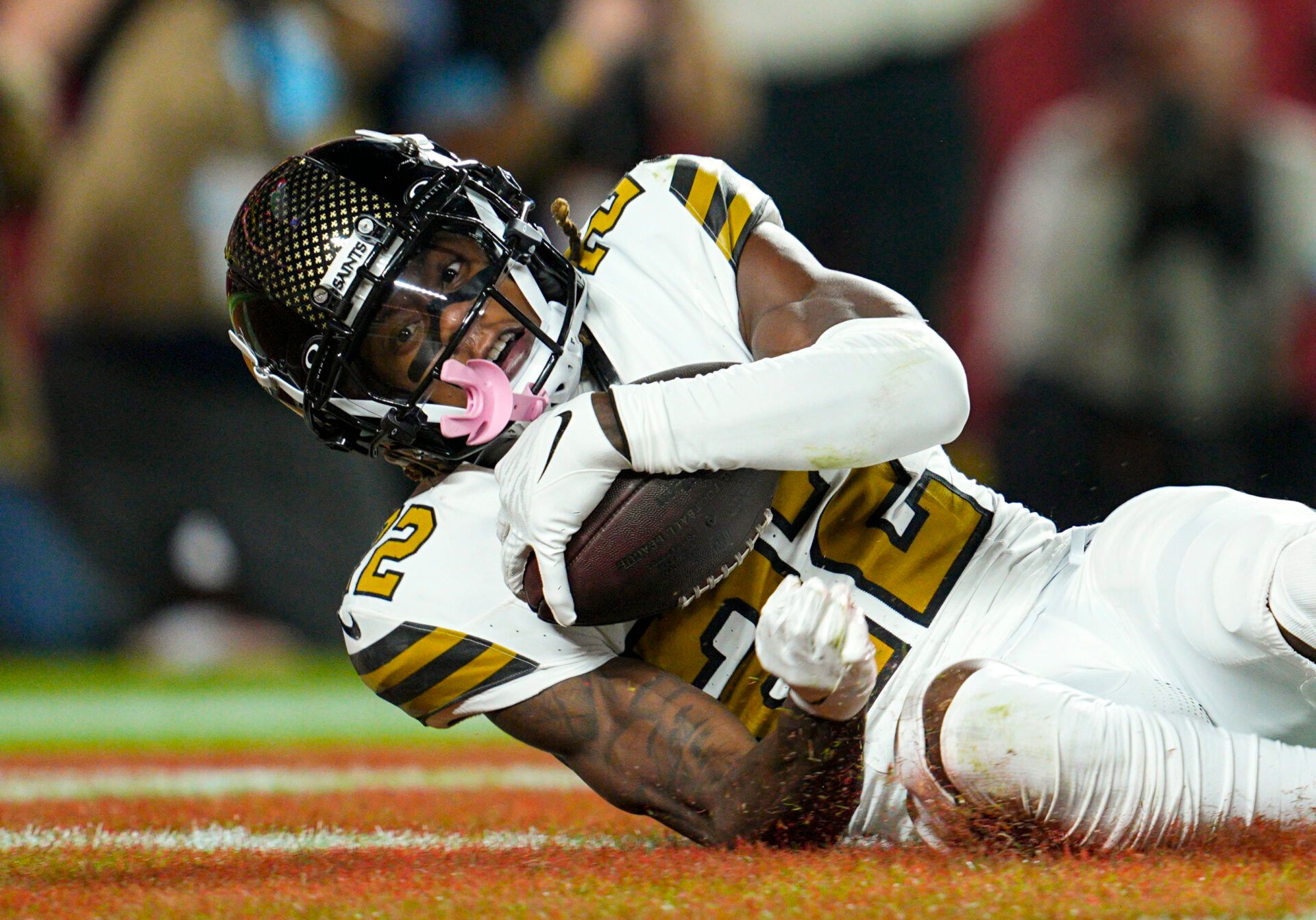 Oct 7, 2024; Kansas City, Missouri, USA; New Orleans Saints wide receiver Rashid Shaheed (22) catches a touchdown pass during the first half against the Kansas City Chiefs at GEHA Field at Arrowhead Stadium. Mandatory Credit: Jay Biggerstaff-Imagn Images