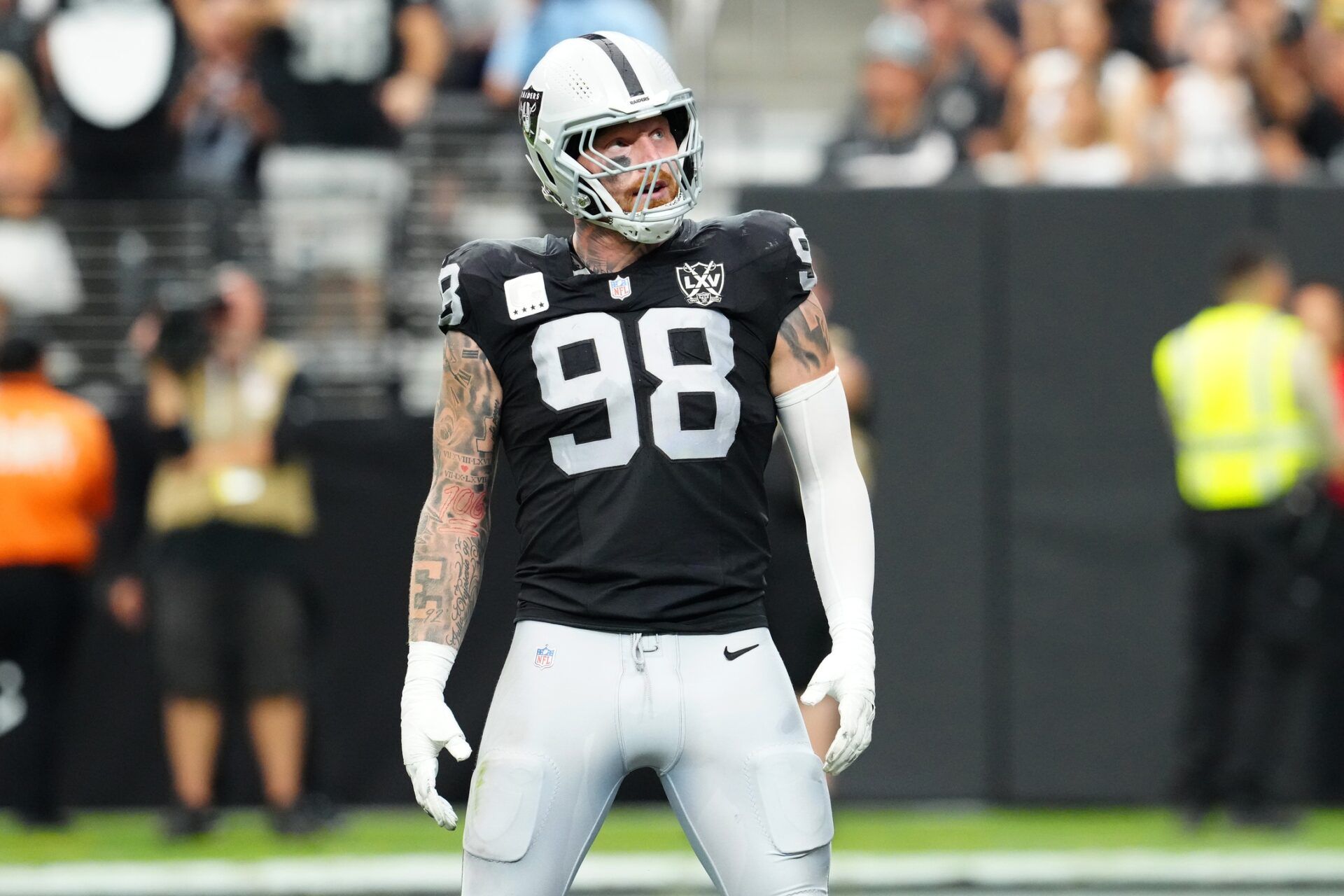 Las Vegas Raiders defensive end Maxx Crosby (98) celebrates after getting a sack against the Carolina Panthers during the second quarter at Allegiant Stadium. 