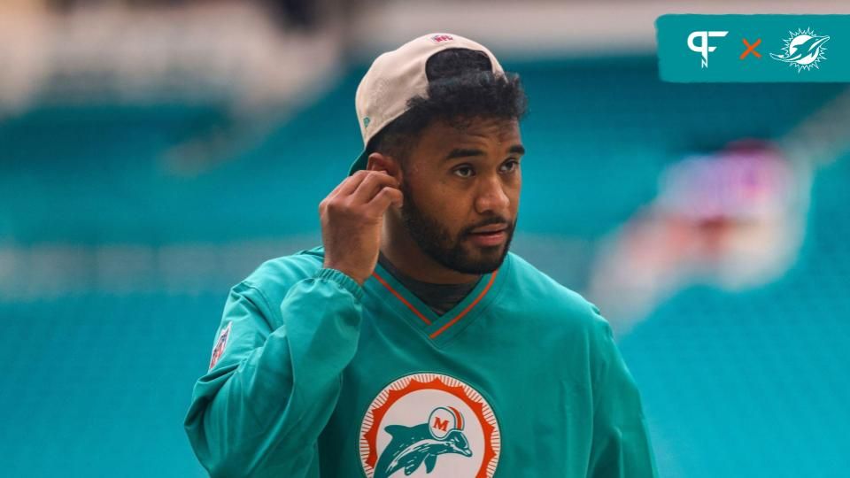 Miami Dolphins quarterback Tua Tagovailoa (1) walks on the field before a game against the Buffalo Bills at Hard Rock Stadium.