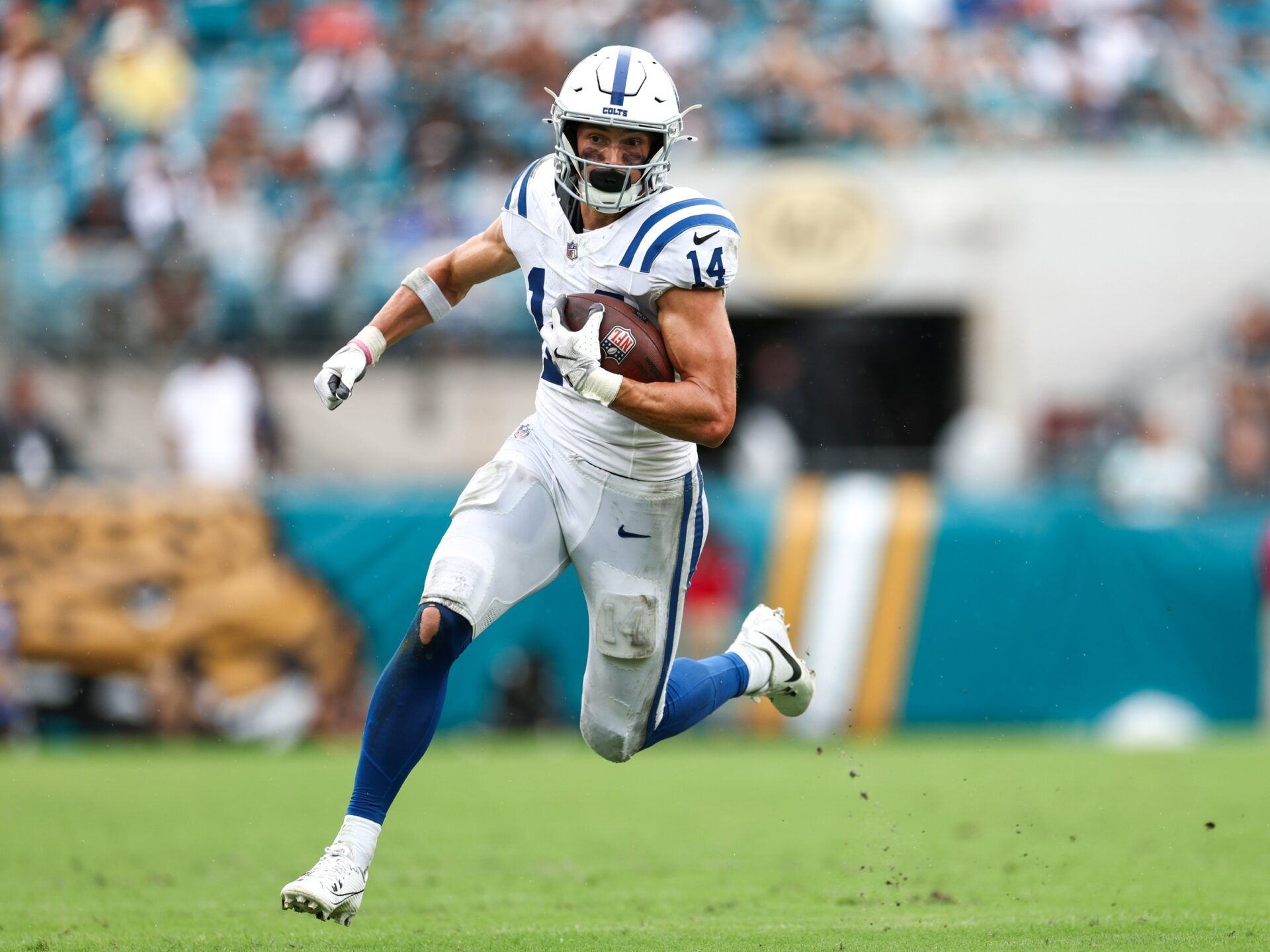 Indianapolis Colts wide receiver Alec Pierce (14) runs with the ball against the Jacksonville Jaguars in the fourth quarter at EverBank Stadium.