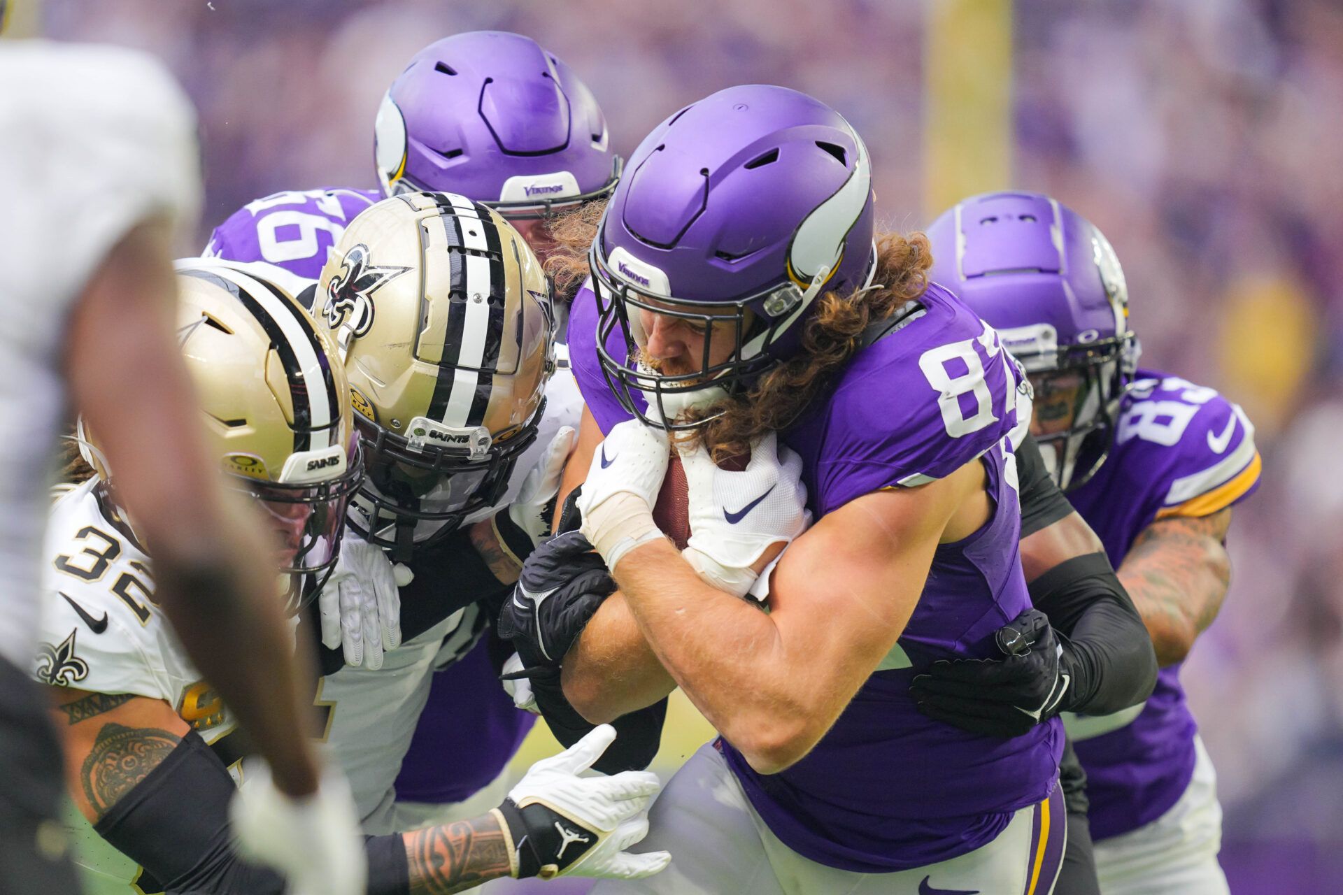 Nov 12, 2023; Minneapolis, Minnesota, USA; Minnesota Vikings tight end T.J. Hockenson (87) is tackled against the New Orleans Saints in the second quarter at U.S. Bank Stadium. Mandatory Credit: Brad Rempel-USA TODAY Sports