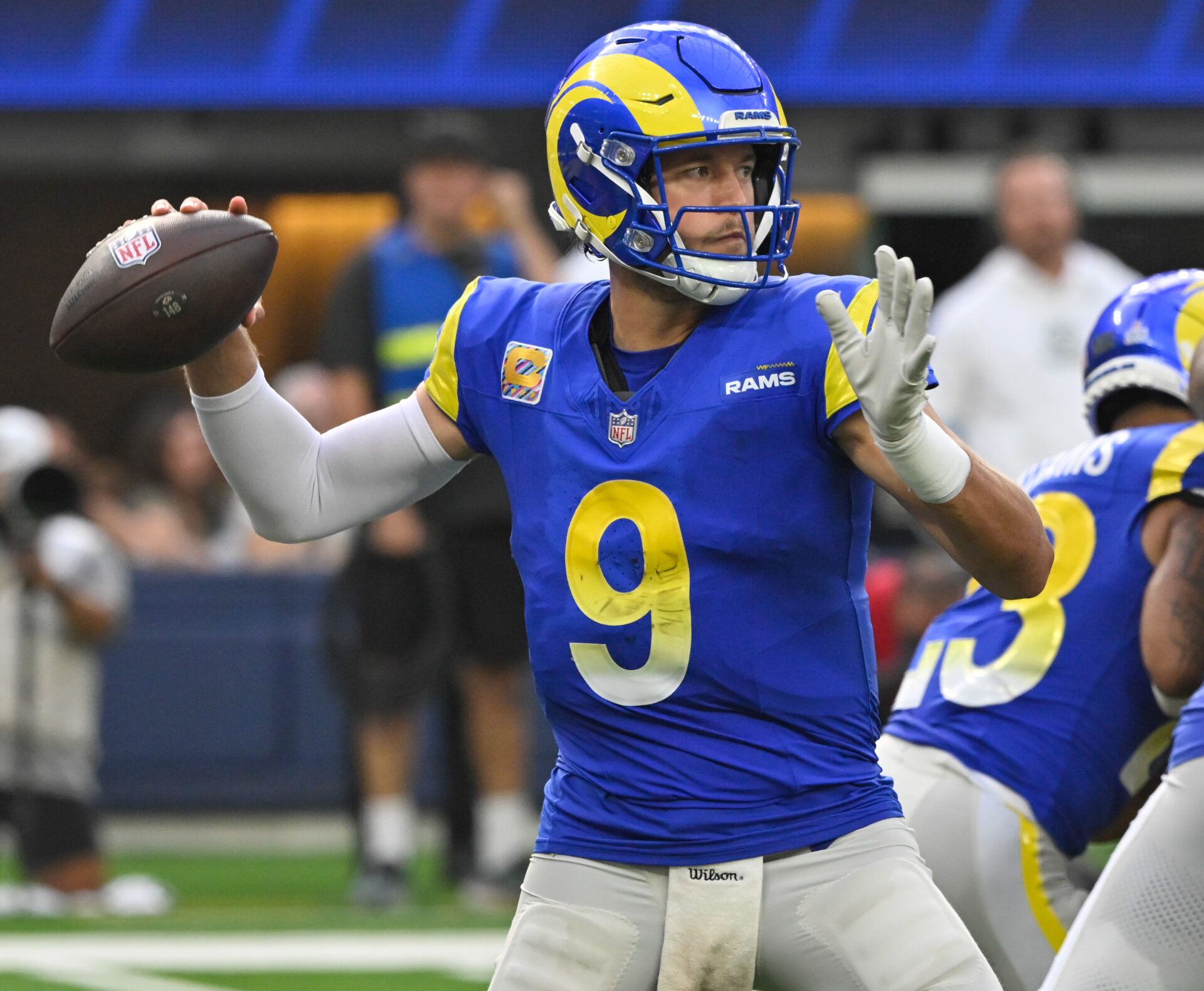 Oct 6, 2024; Inglewood, California, USA; Los Angeles Rams quarterback Matthew Stafford (9) throws a pass during the third quarter against the Green Bay Packers at SoFi Stadium. Mandatory Credit: Robert Hanashiro-Imagn Images