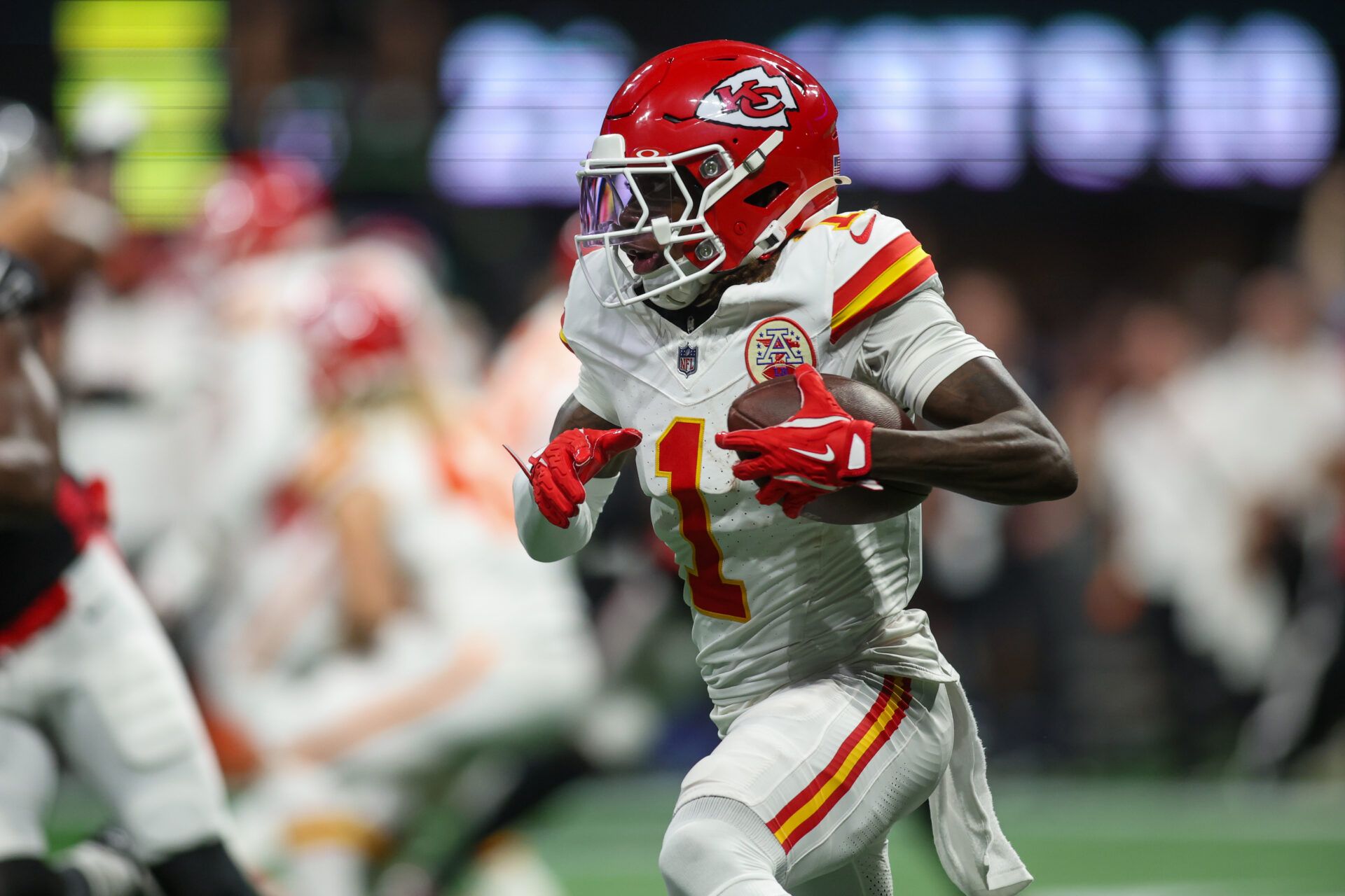 Sep 22, 2024; Atlanta, Georgia, USA; Kansas City Chiefs wide receiver Xavier Worthy (1) runs after a catch against the Atlanta Falcons in the first quarter at Mercedes-Benz Stadium. Mandatory Credit: Brett Davis-Imagn Images