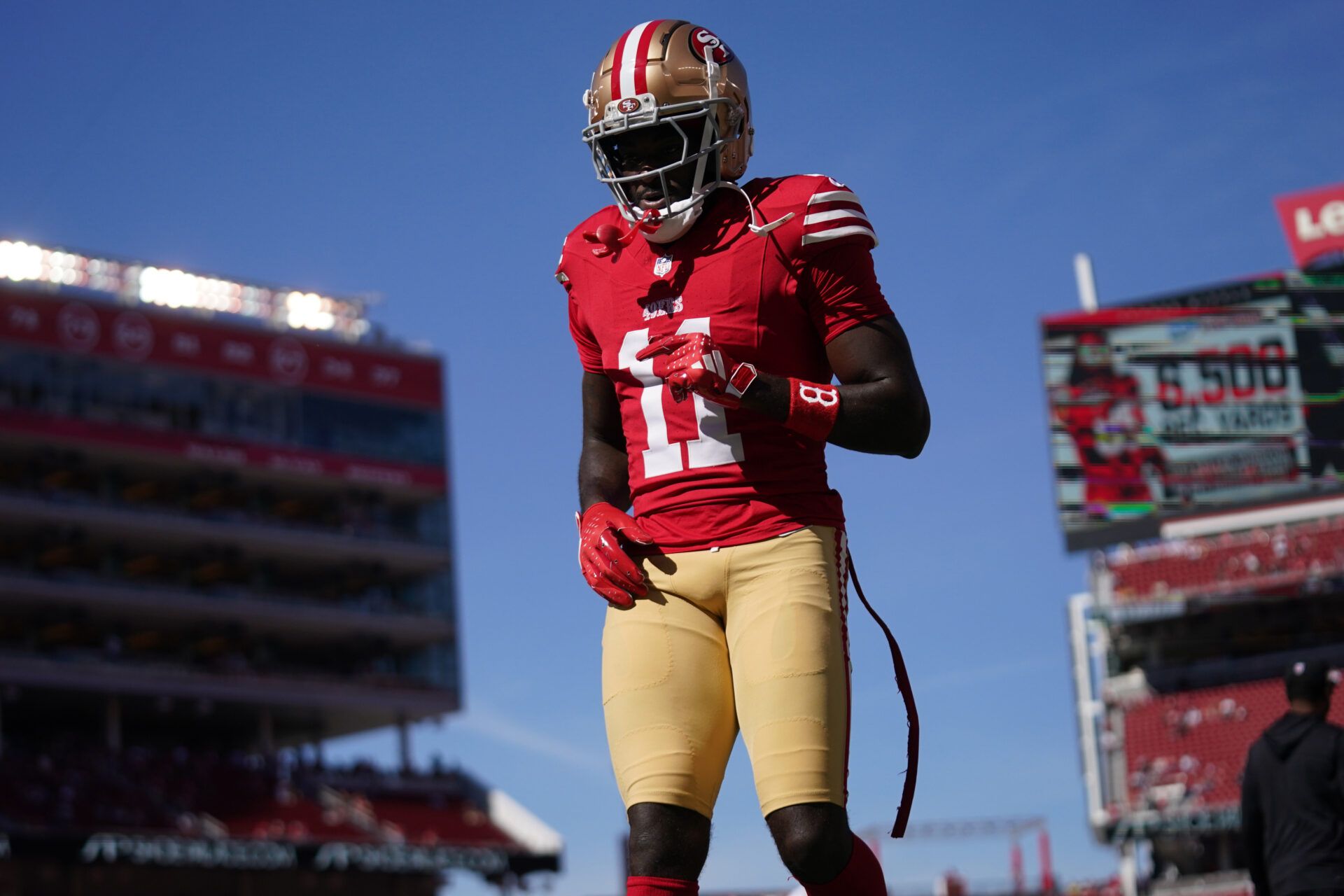 San Francisco 49ers wide receiver Brandon Aiyuk (11) walks on the field before the start of the game against the Kansas City Chiefs at Levi's Stadium.