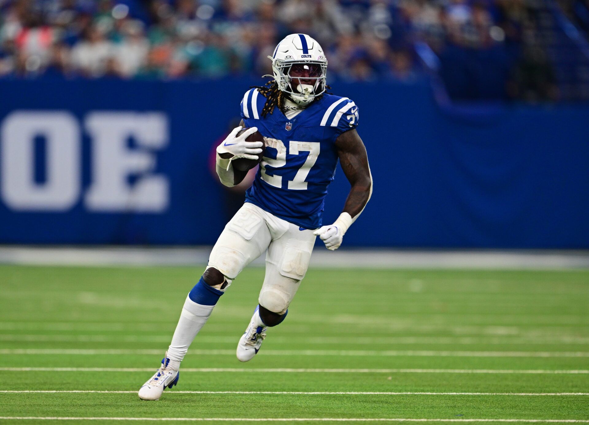 Indianapolis Colts running back Trey Sermon (27) runs the ball during the second half against the Miami Dolphins at Lucas Oil Stadium.