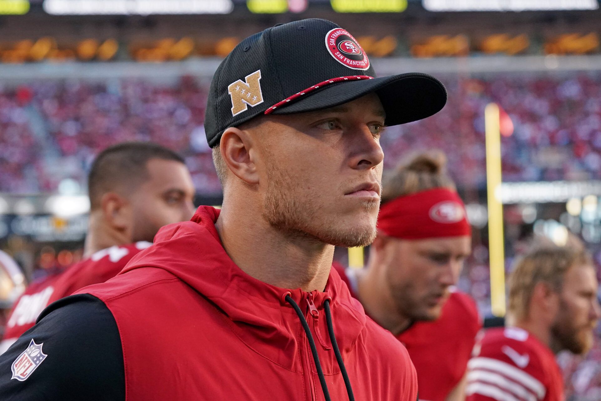 Sep 9, 2024; Santa Clara, California, USA; San Francisco 49ers running back Christian McCaffrey (23) watches injured from the sidelines in the second quarter against the New York Jets at Levi's Stadium. Mandatory Credit: David Gonzales-Imagn Images