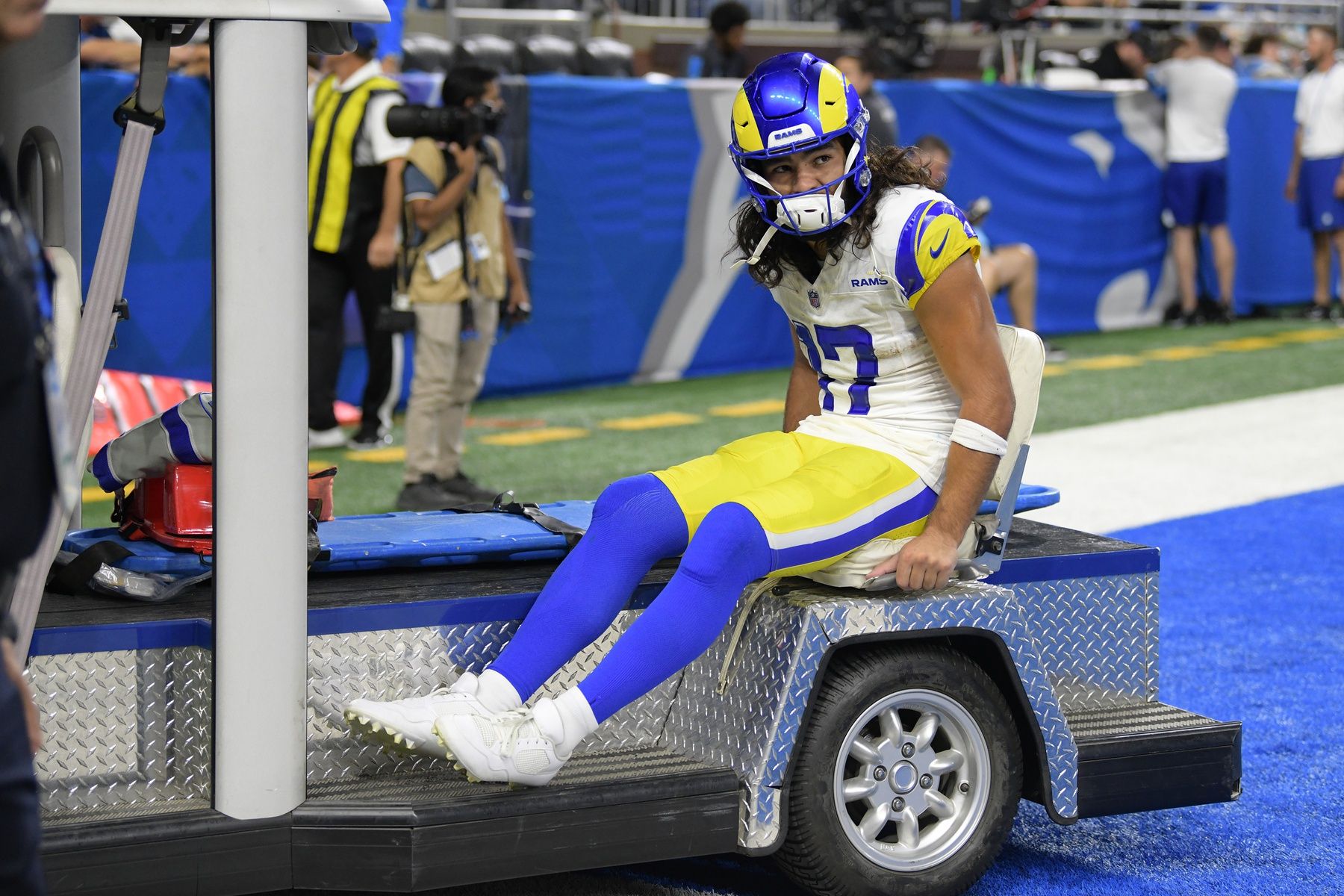 Los Angeles Rams wide receiver Puka Nacua (17) is carted off the field after being injured against the Detroit Lions in the first half at Ford Field.