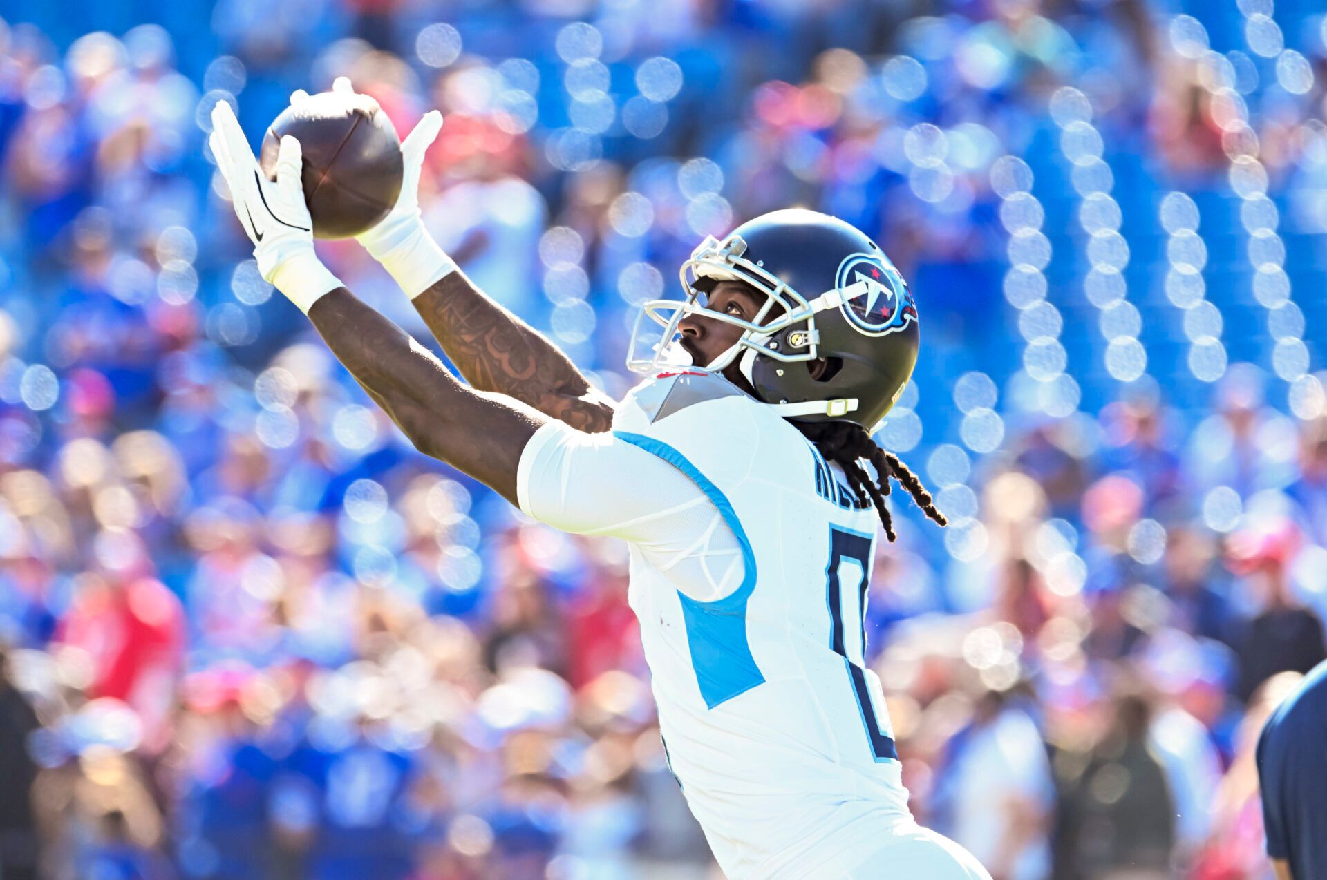 Oct 20, 2024; Orchard Park, New York, USA; Tennessee Titans wide receiver Calvin Ridley (0) warms up before a game against the Buffalo Bills at Highmark Stadium. Mandatory Credit: Mark Konezny-Imagn Images