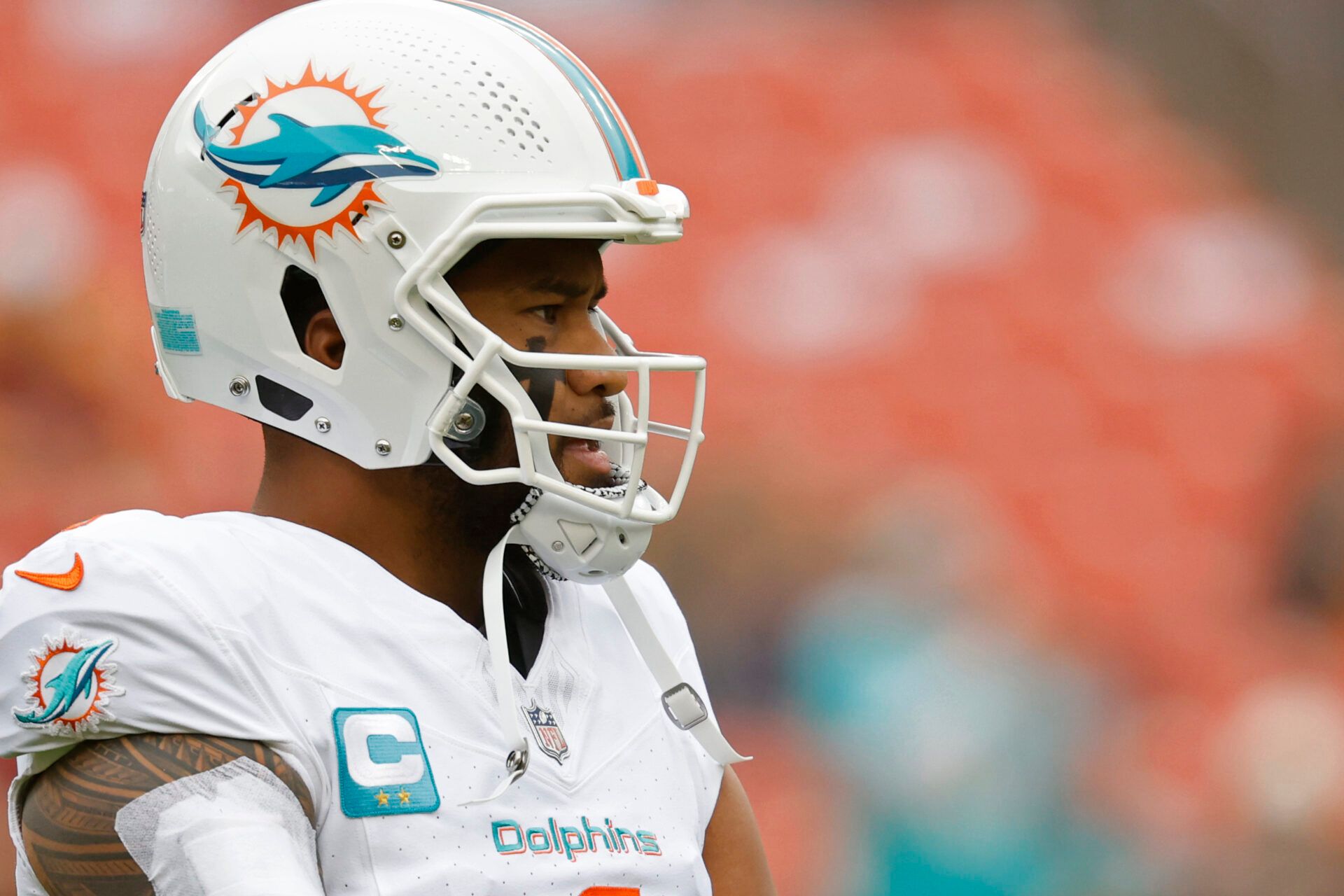 Dec 3, 2023; Landover, Maryland, USA; Miami Dolphins quarterback Tua Tagovailoa (1) stands on the field during warm up prior to the game against the Washington Commanders at FedExField. Mandatory Credit: Geoff Burke-USA TODAY Sports