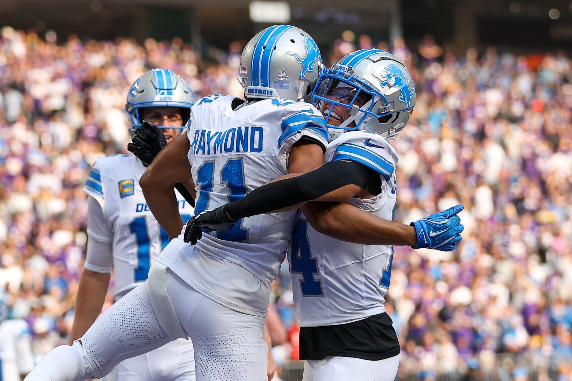 Oct 20, 2024; Minneapolis, Minnesota, USA; Detroit Lions wide receiver Kalif Raymond (11) celebrates his touchdown against the Minnesota Vikings during the third quarter at U.S. Bank Stadium. Mandatory Credit: Matt Krohn-Imagn Images