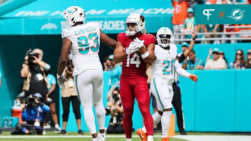 Arizona Cardinals wide receiver Michael Wilson (14) celebrates after scoring a touchdown against the Miami Dolphins during the second quarter at Hard Rock Stadium.