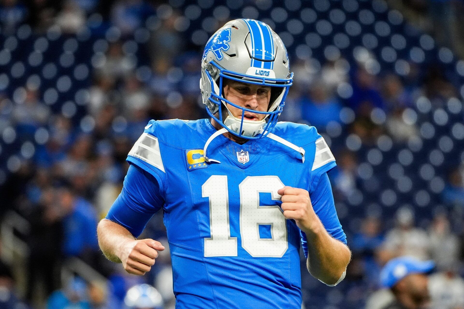 Detroit Lions quarterback Jared Goff (16) warms up before the Tennessee Titans game at Ford Field in Detroit on Sunday, Oct. 27, 2024.