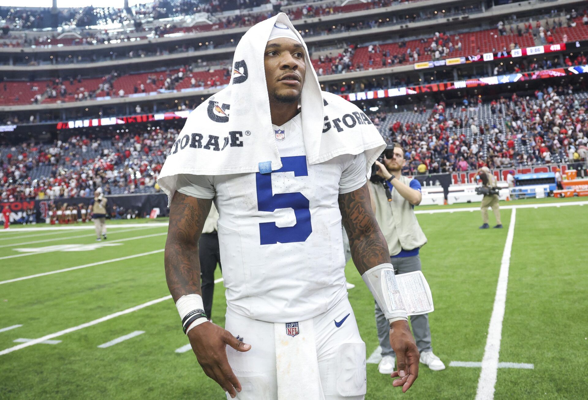 Indianapolis Colts quarterback Anthony Richardson (5) stands on the field after the game against the Houston Texans at NRG Stadium.