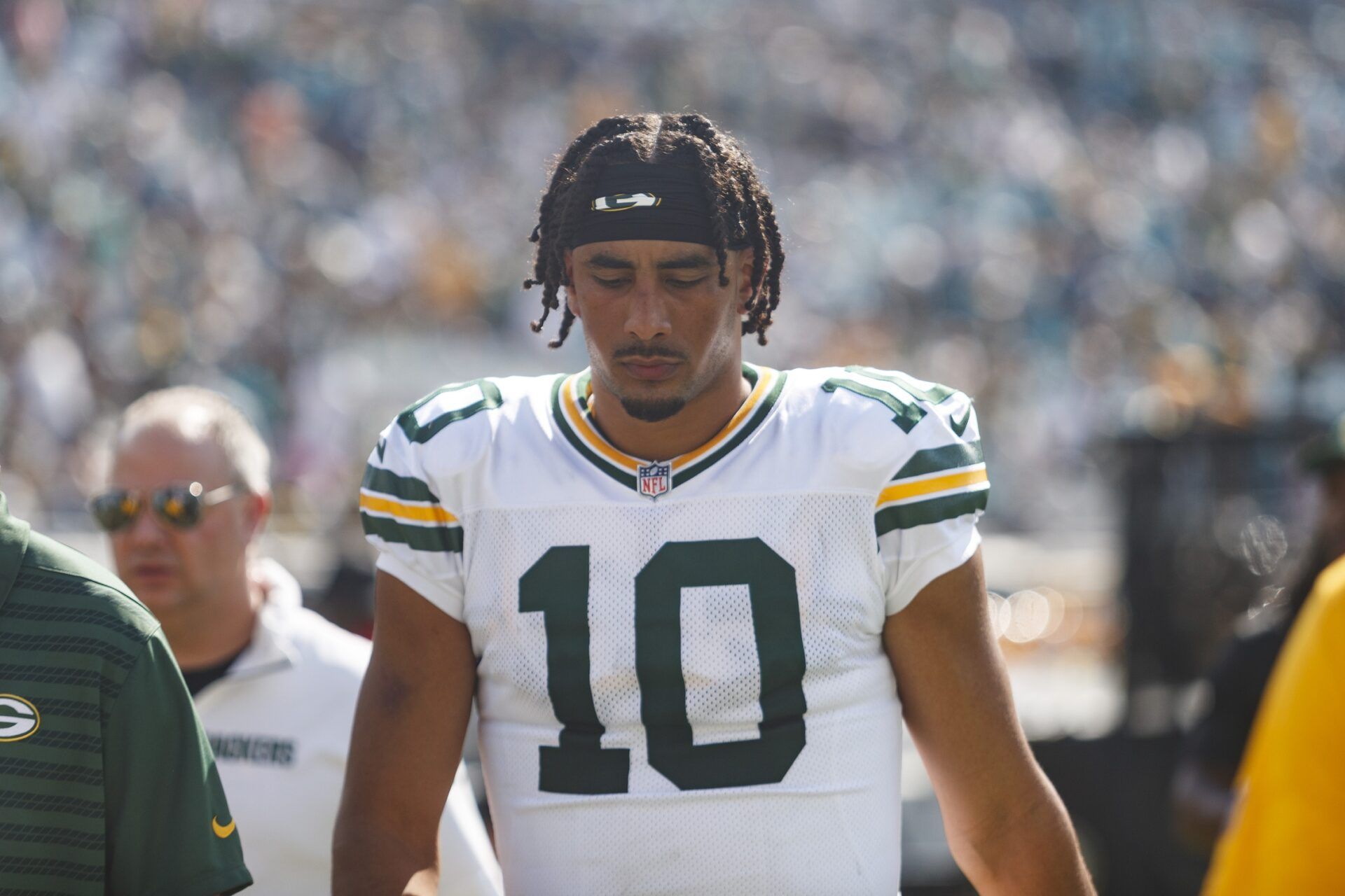 Green Bay Packers quarterback Jordan Love (10) walks into the locker room for half time against the Jacksonville Jaguars at EverBank Stadium.