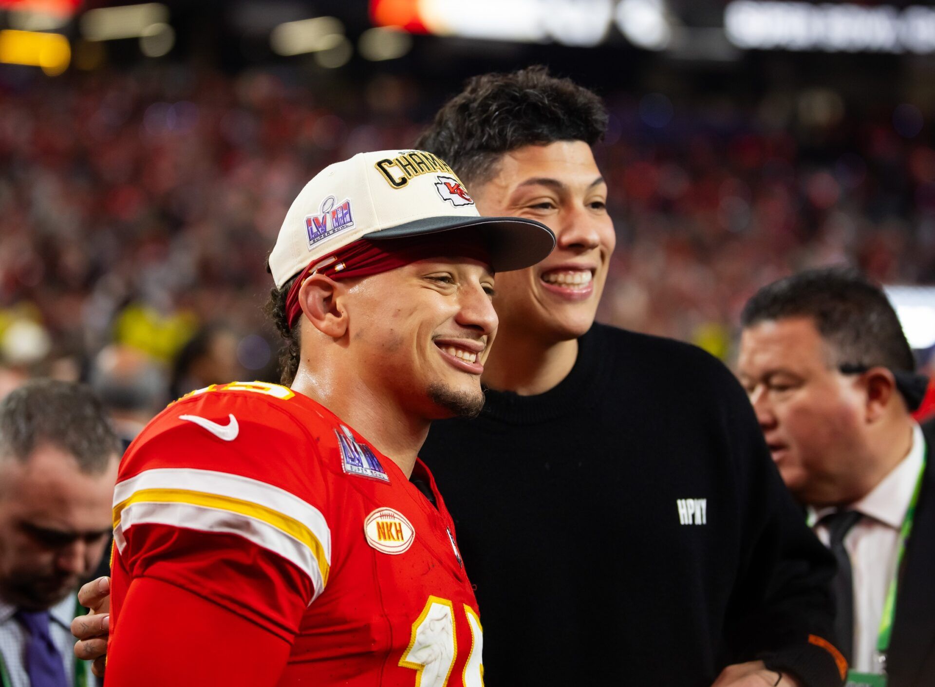 Kansas City Chiefs quarterback Patrick Mahomes (left) celebrates with brother Jackson Mahomes after defeating the San Francisco 49ers in overtime of Super Bowl LVIII at Allegiant Stadium.