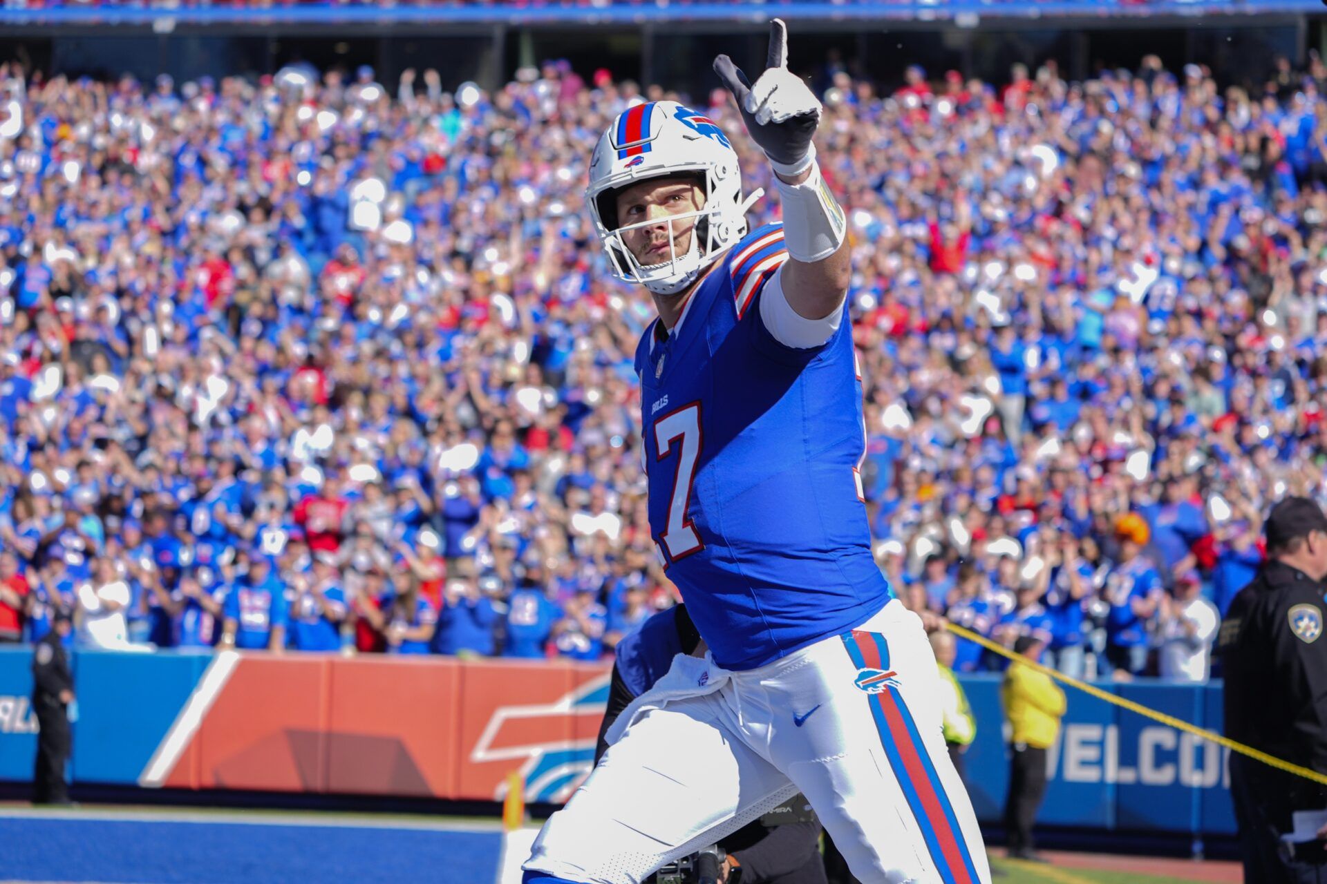 Buffalo Bills quarterback Josh Allen (17) runs onto the field prior to the start of the game against the Tennessee Titans at Highmark Stadium.