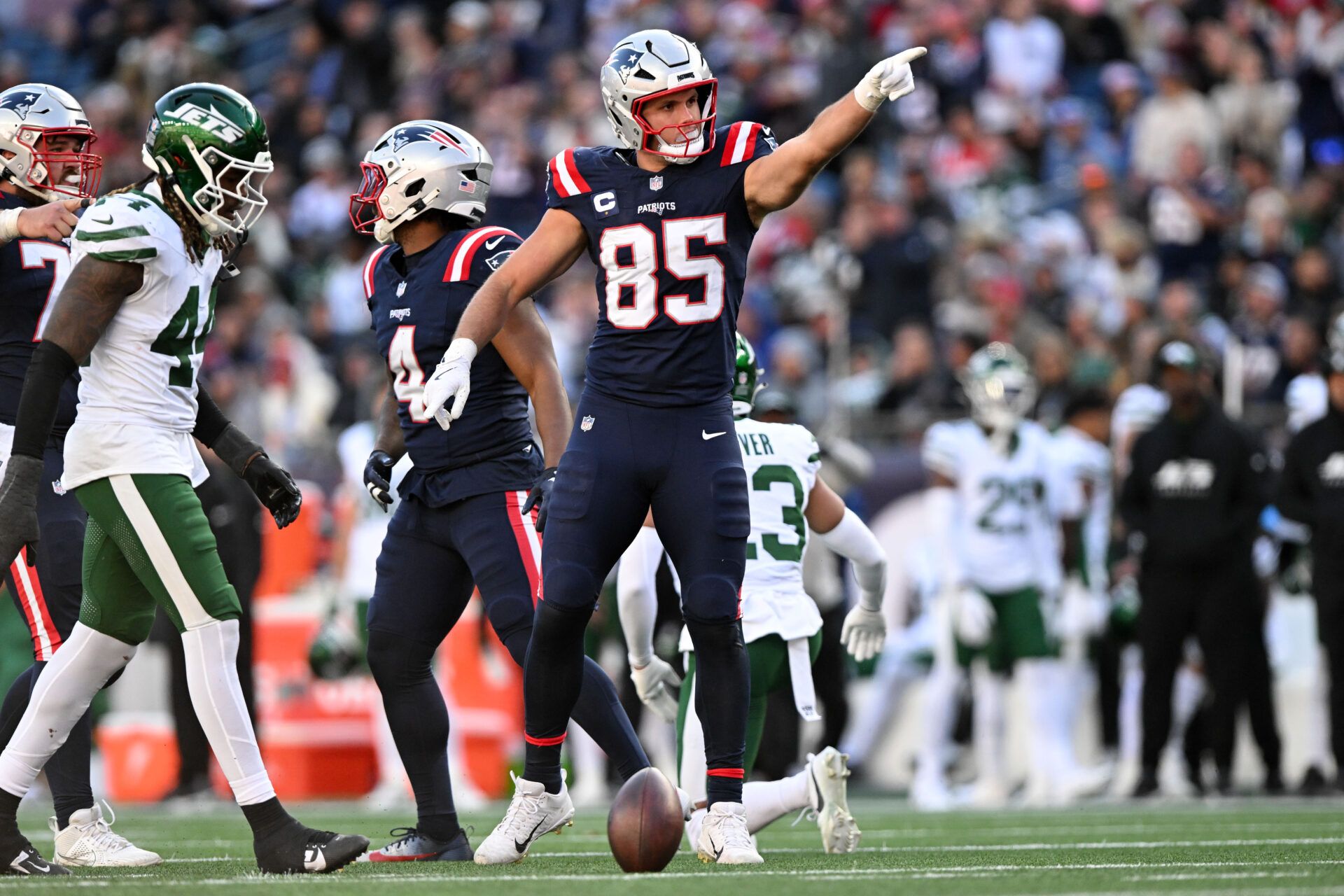 Oct 27, 2024; Foxborough, Massachusetts, USA; New England Patriots tight end Hunter Henry (85) reacts after a first down against the New York Jets during the second half at Gillette Stadium. Mandatory Credit: Brian Fluharty-Imagn Images